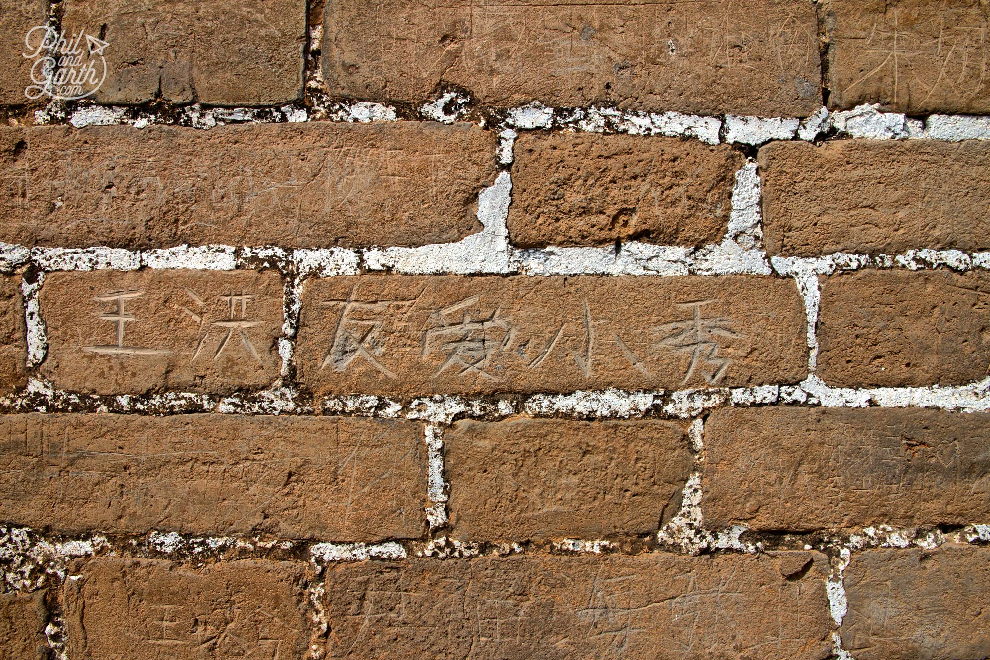 Close up of the wall with some graffiti