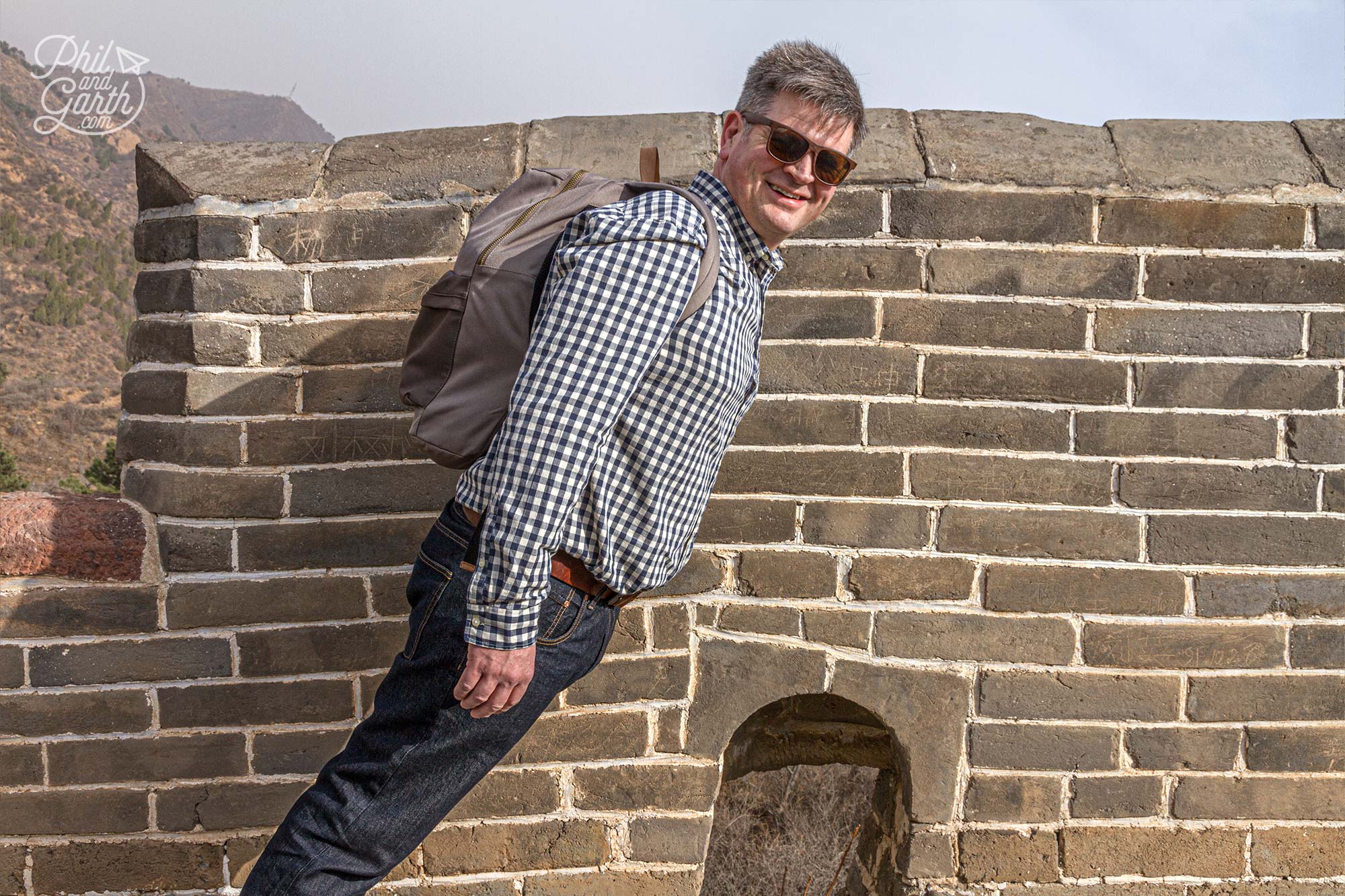 Phil performs magic tricks on the Great Wall of China