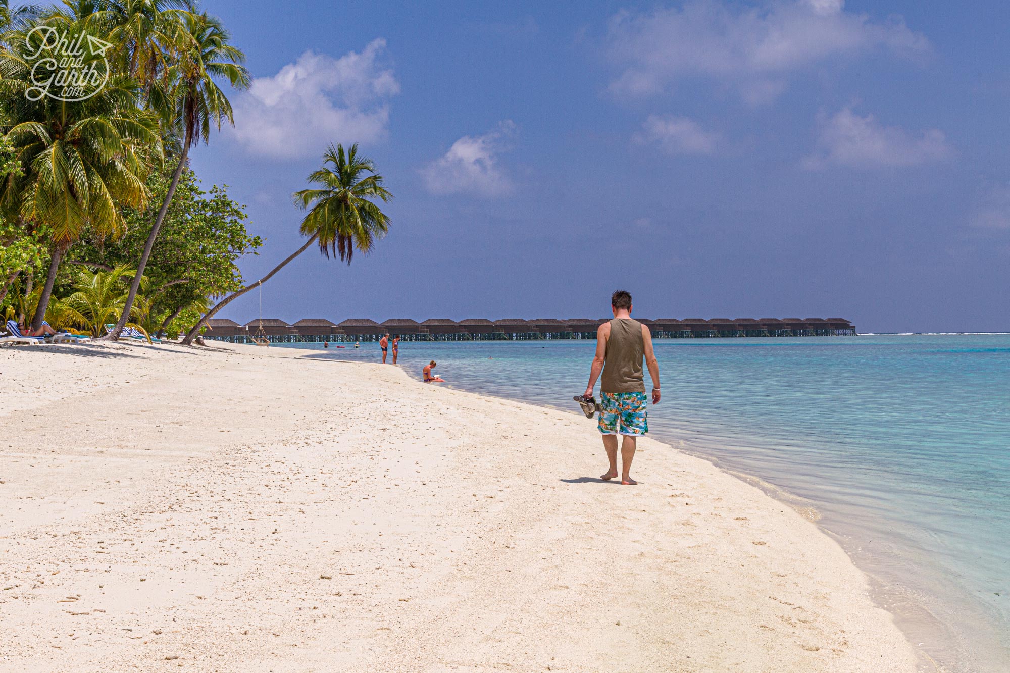 Phil taking a walk down the beach in Meeru Maldives