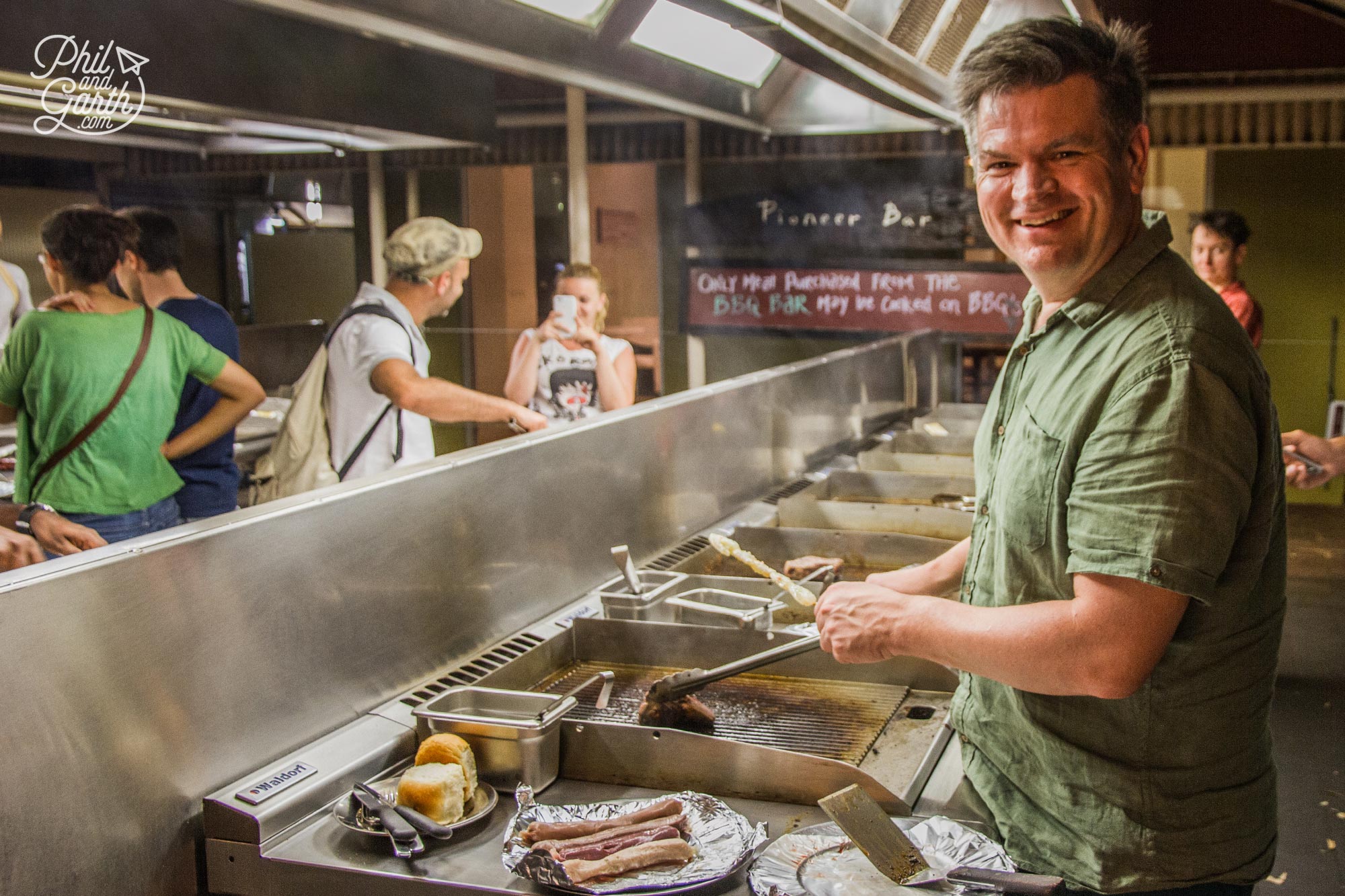 Phil using the Outback Hotel's DIY BBQ