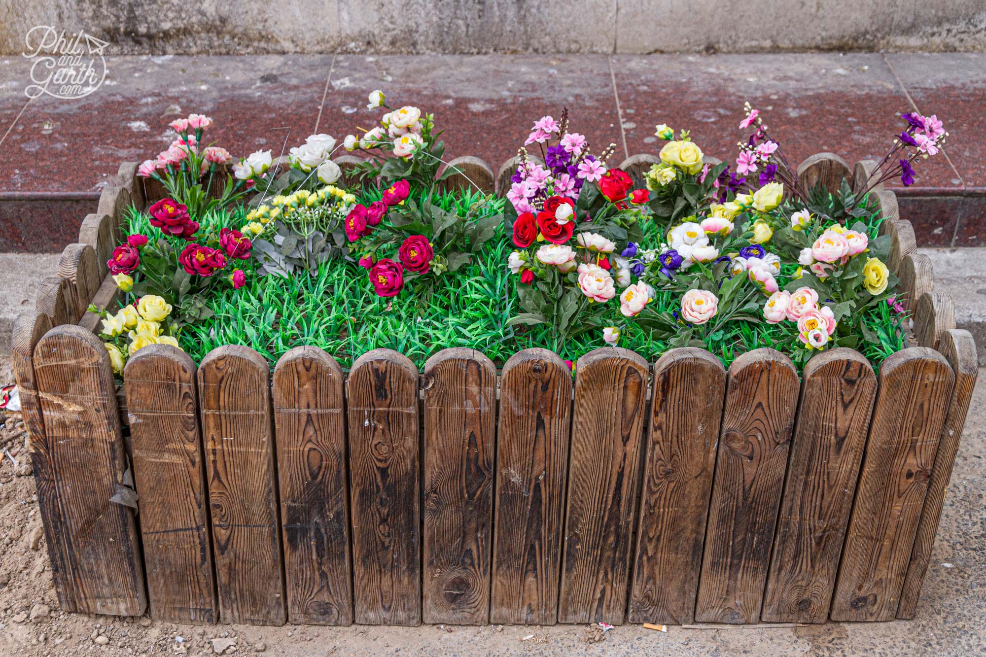 Plastic flowers on the streets of Beijing
