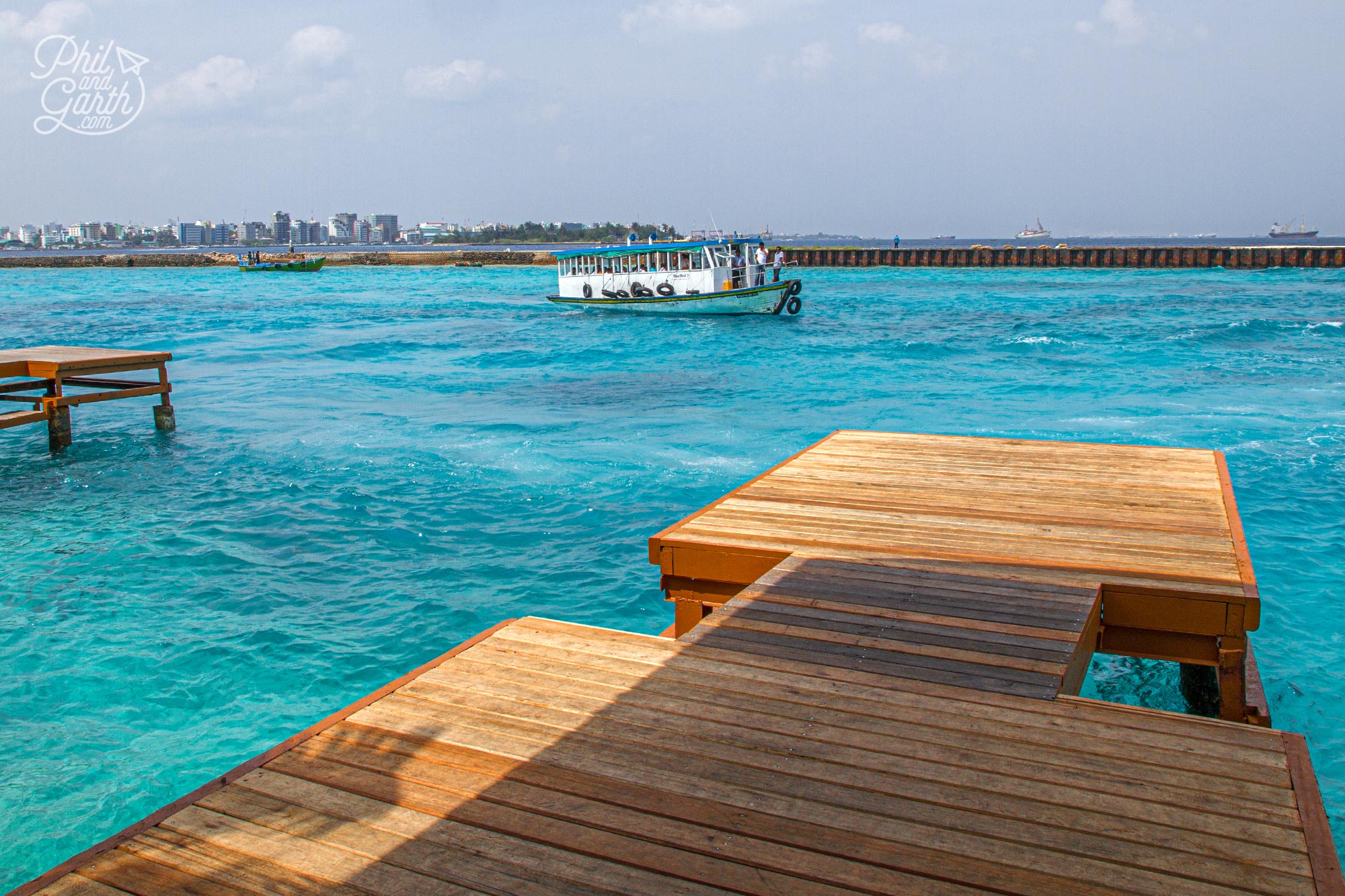 Waiting for our speedboat transfer at Malé International Airport, just look at that turquoise coloured water!