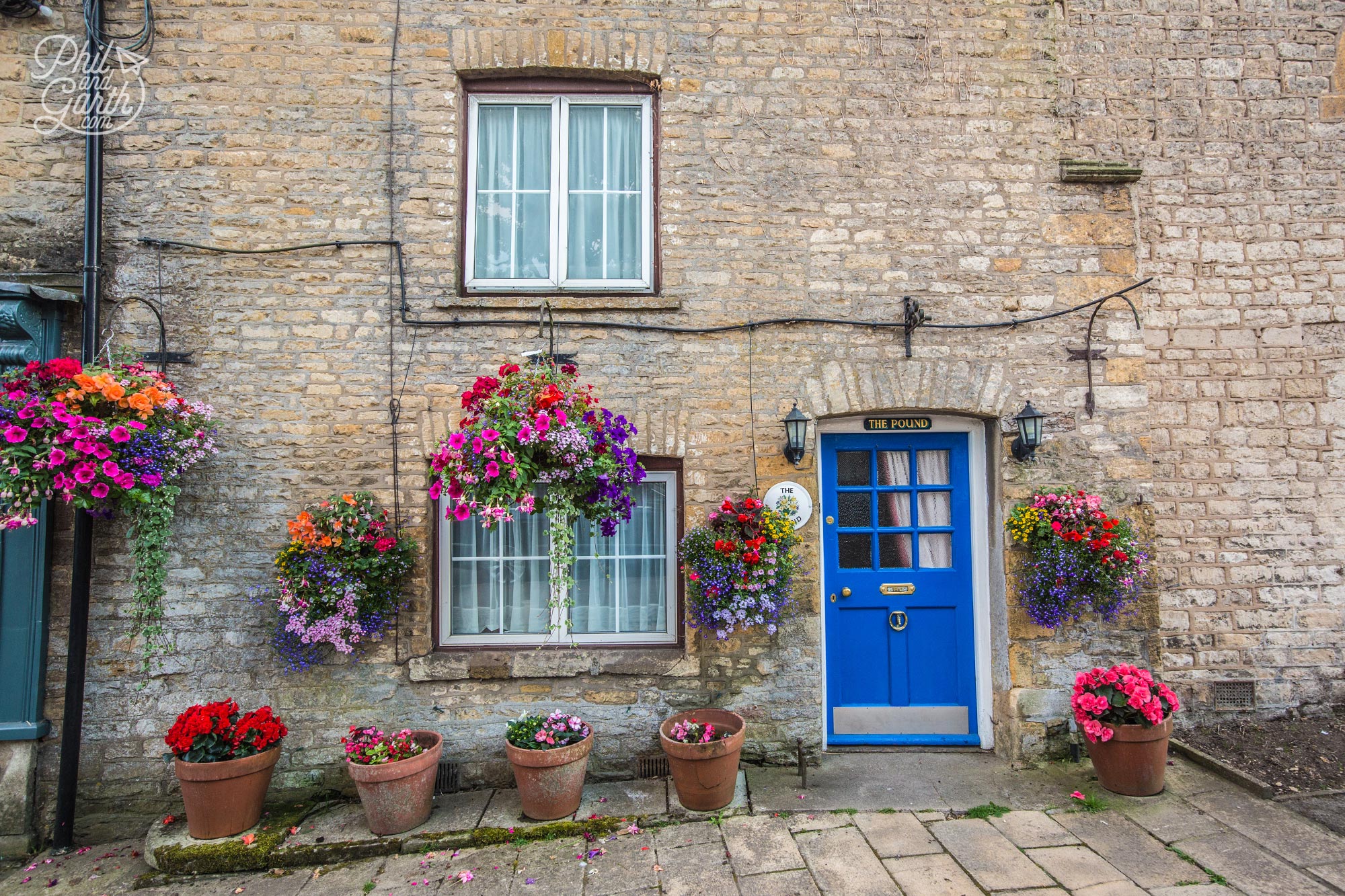 Colourful hanging baskets in Stow-on-the-Wold