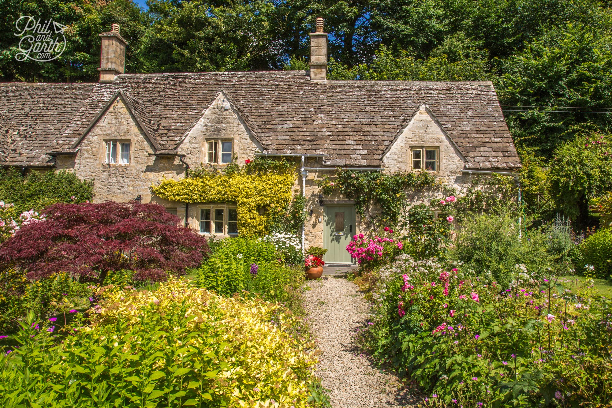 Well manicured English country cottage gardens at Bibury