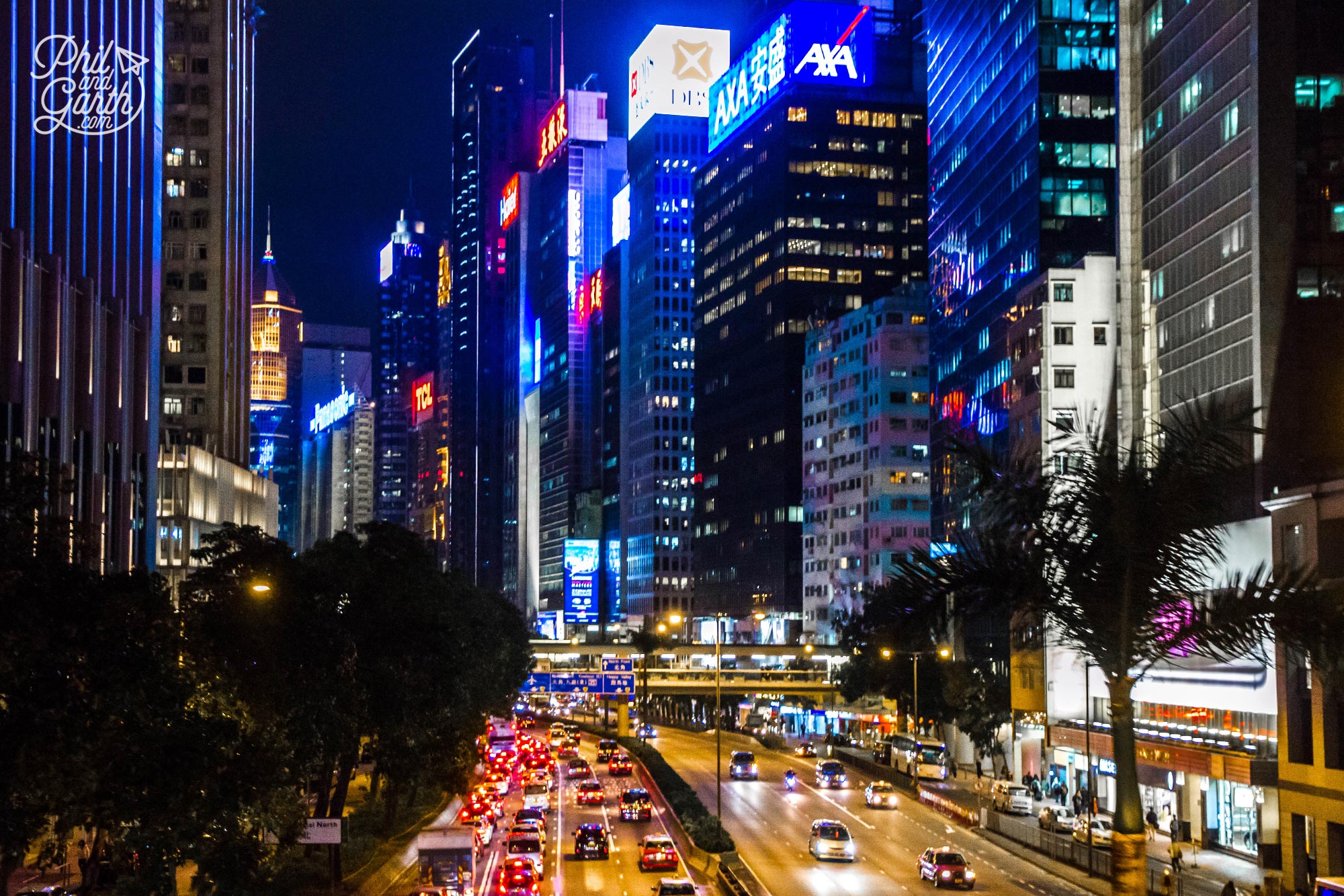 Gigantic neon and LED screens light up streets and buildings