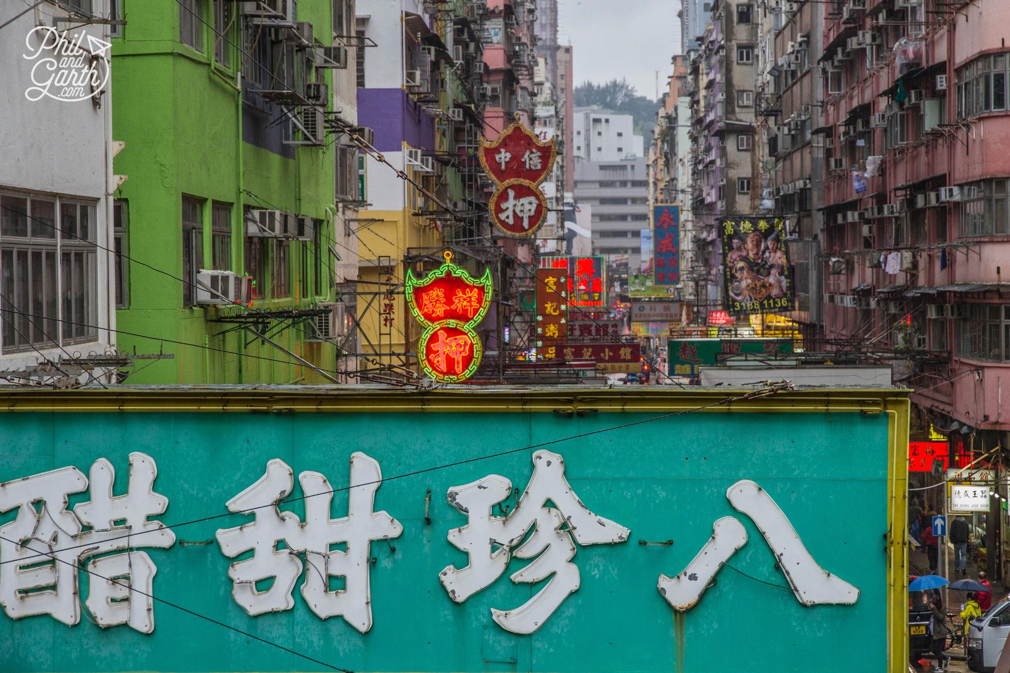 Hundreds of neon signs and lights line the streets of Kowloon