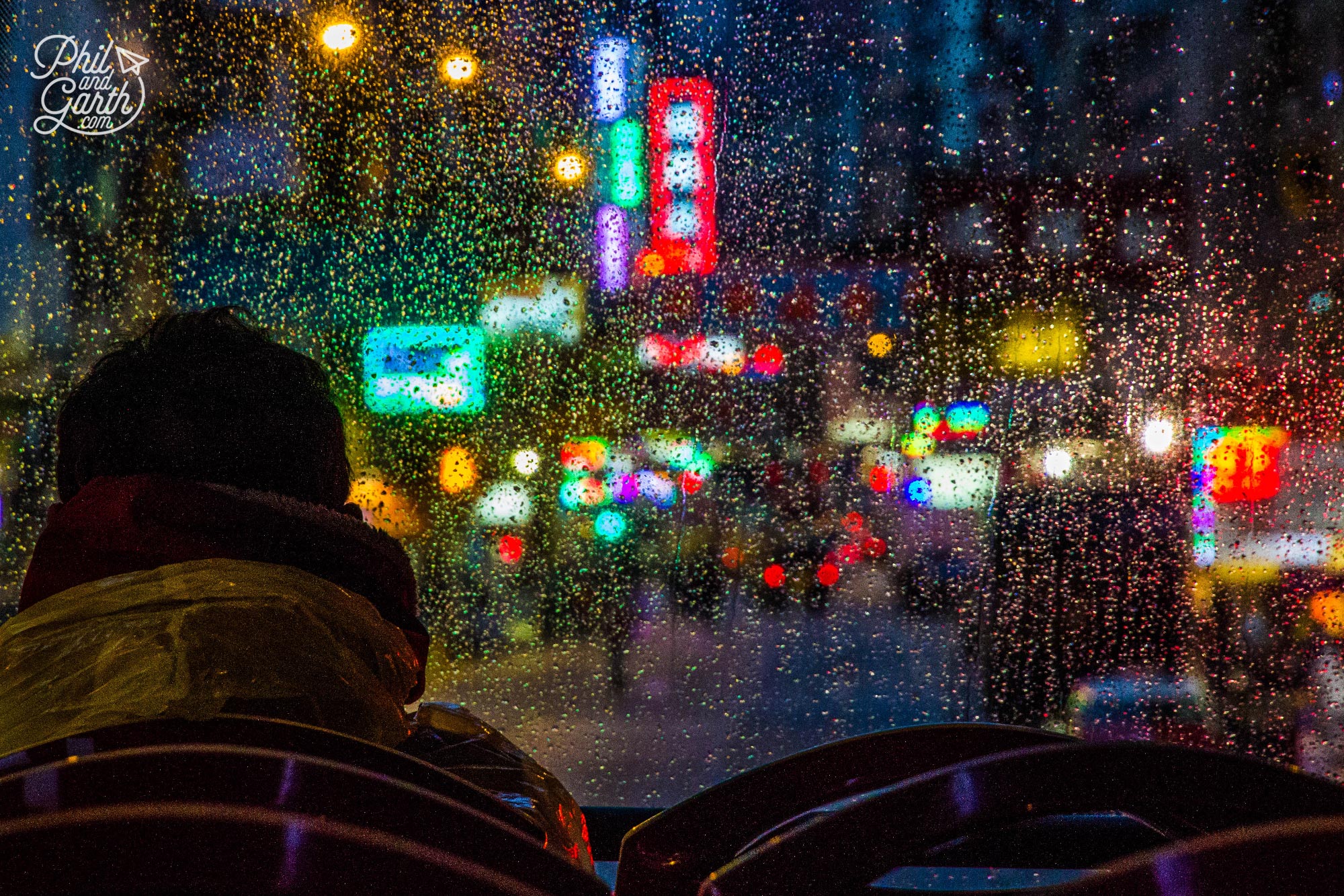 One of our favourite photos taken on the-bus driving through Kowloon