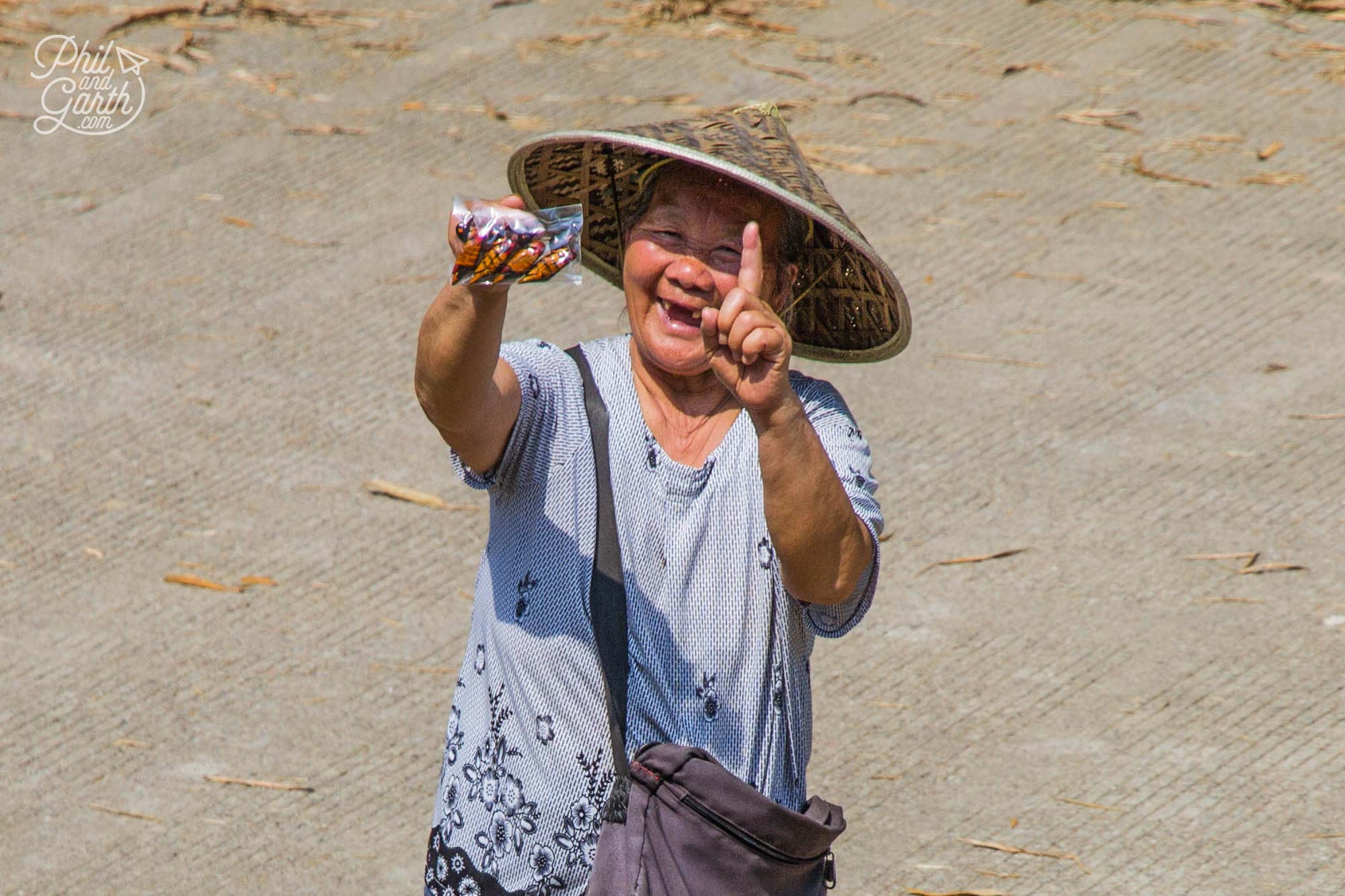 A hawker lady sells everything for 1 dollar!