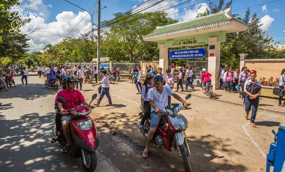 School kids wave to us at this local school