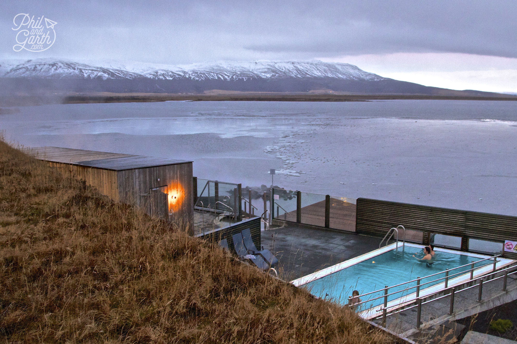 The Best Places To Travel By Month - January for Iceland's dramatic scenery - the backdrop at the Laugarvatn Fontana Spa