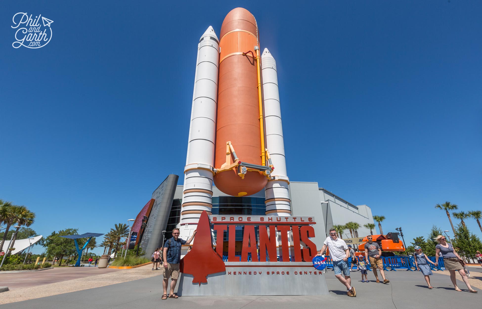 Garth and Phil outside the Space Shuttle Atlantis building