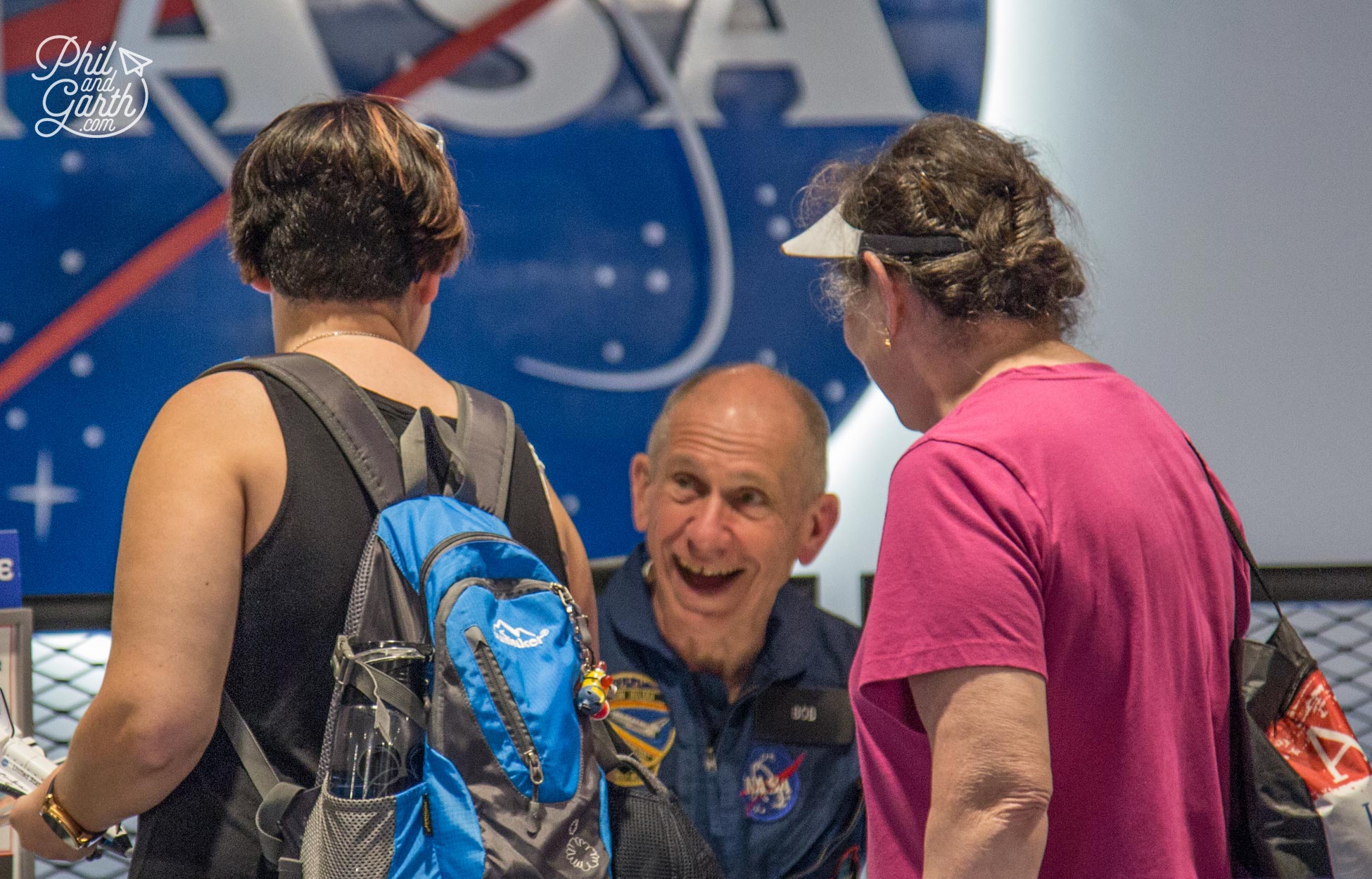 Visitors getting an autograph from Bob Cenker - a real life astronaut!