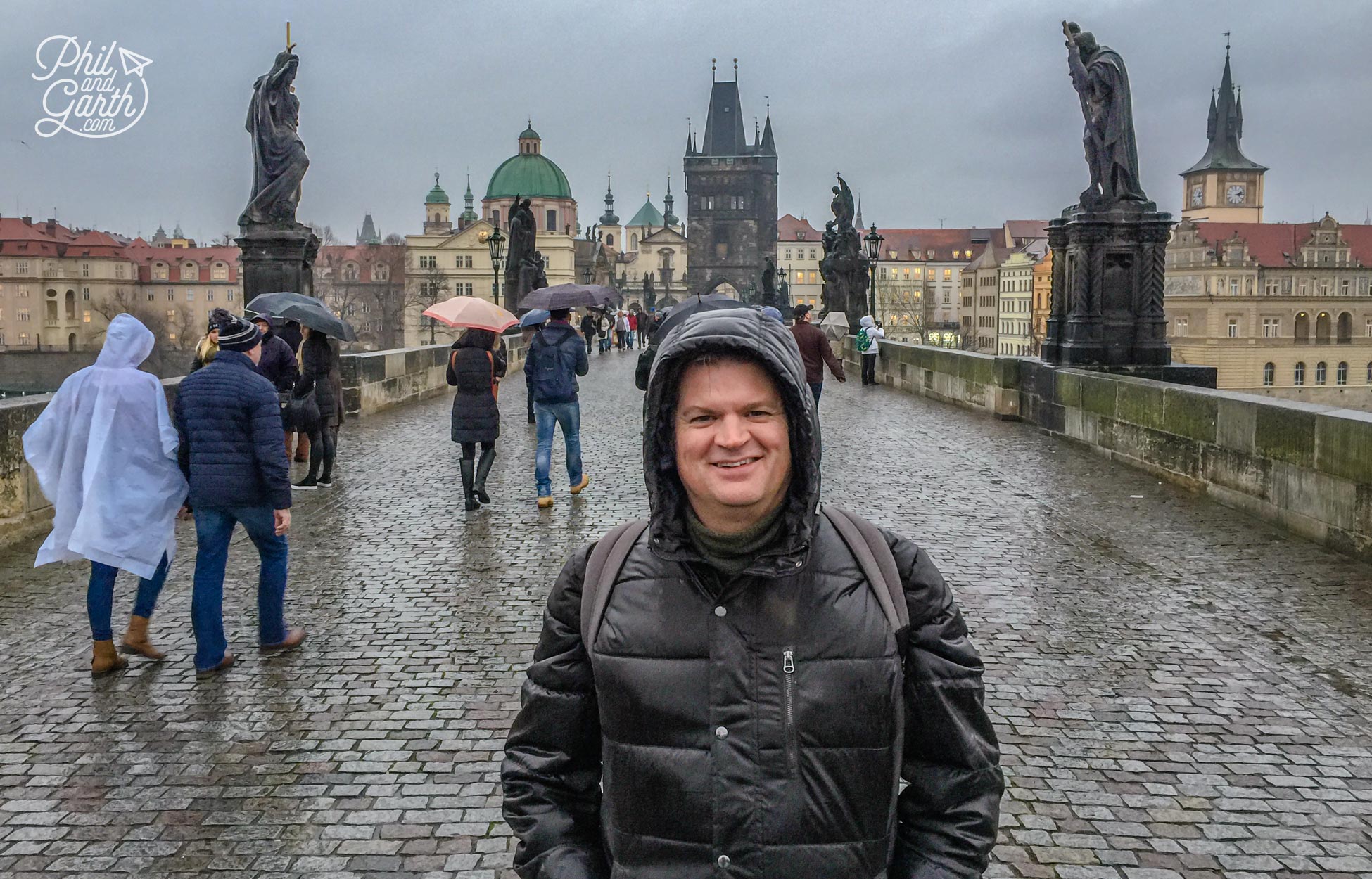 Phil slightly wet after the heavens opened on Charles Bridge