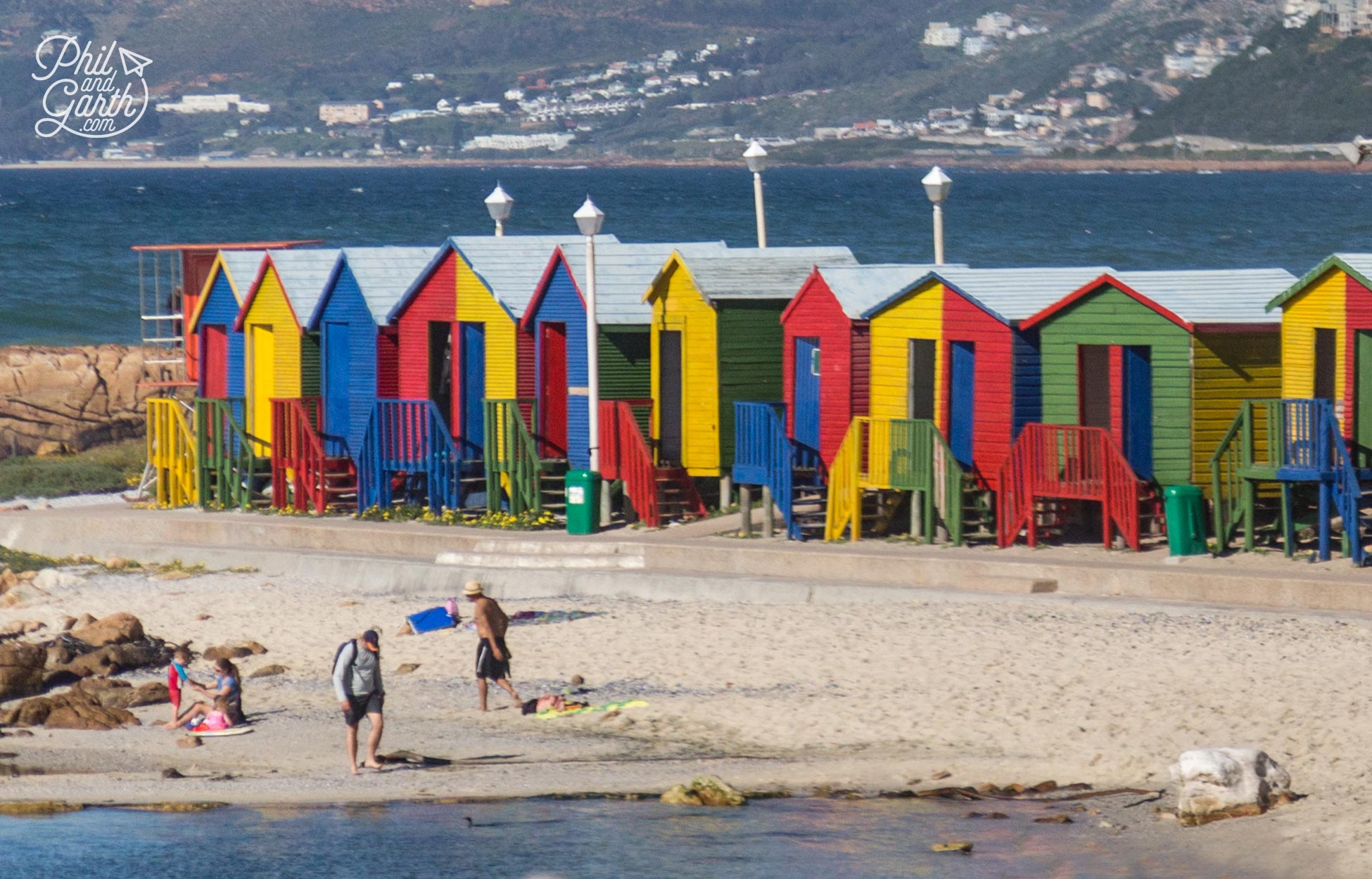 Just some of the colourful Victorian beach huts at Muizenberg Beach