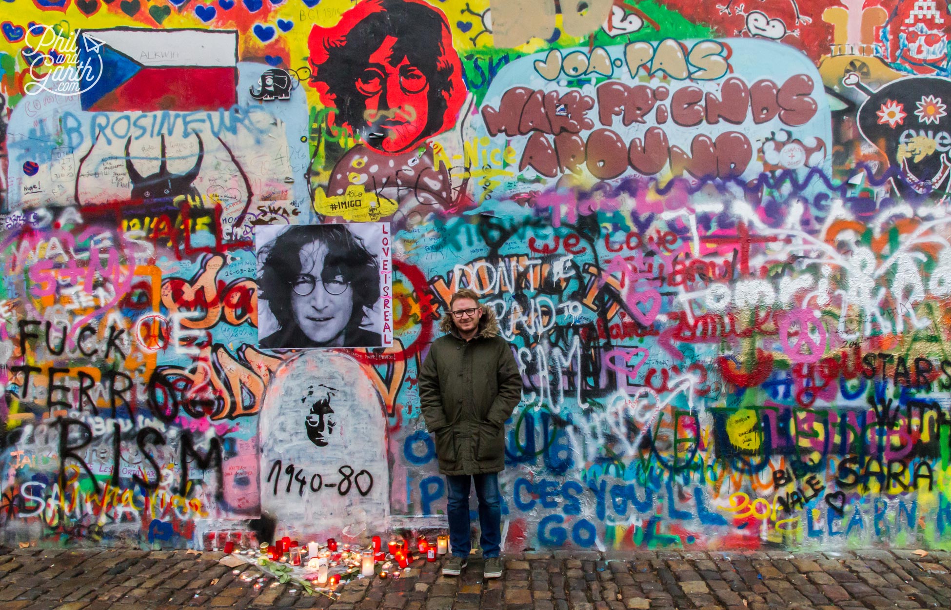 Garth stood at the John Lennon Wall