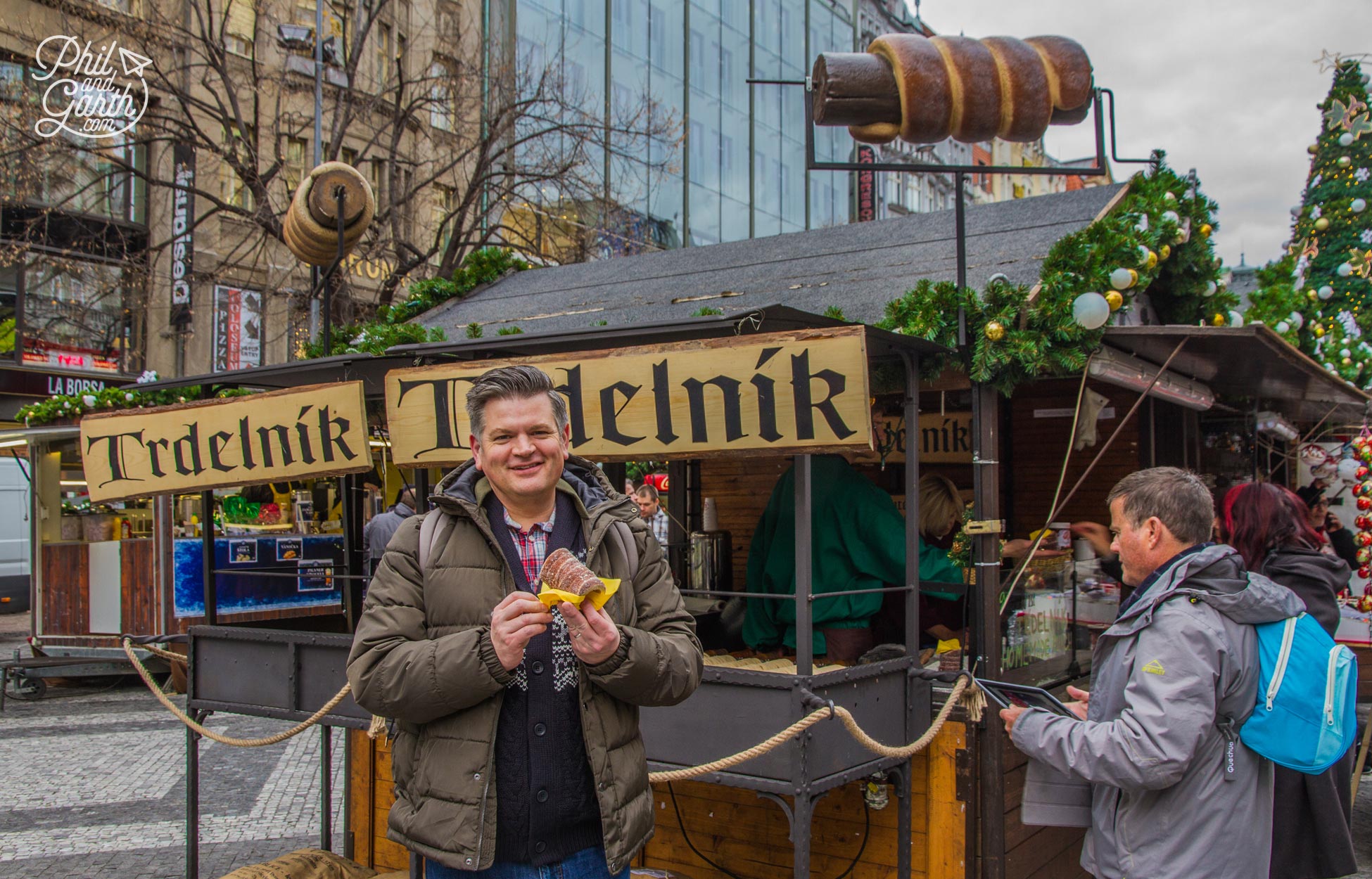 Phil eating his portion of trdelnik