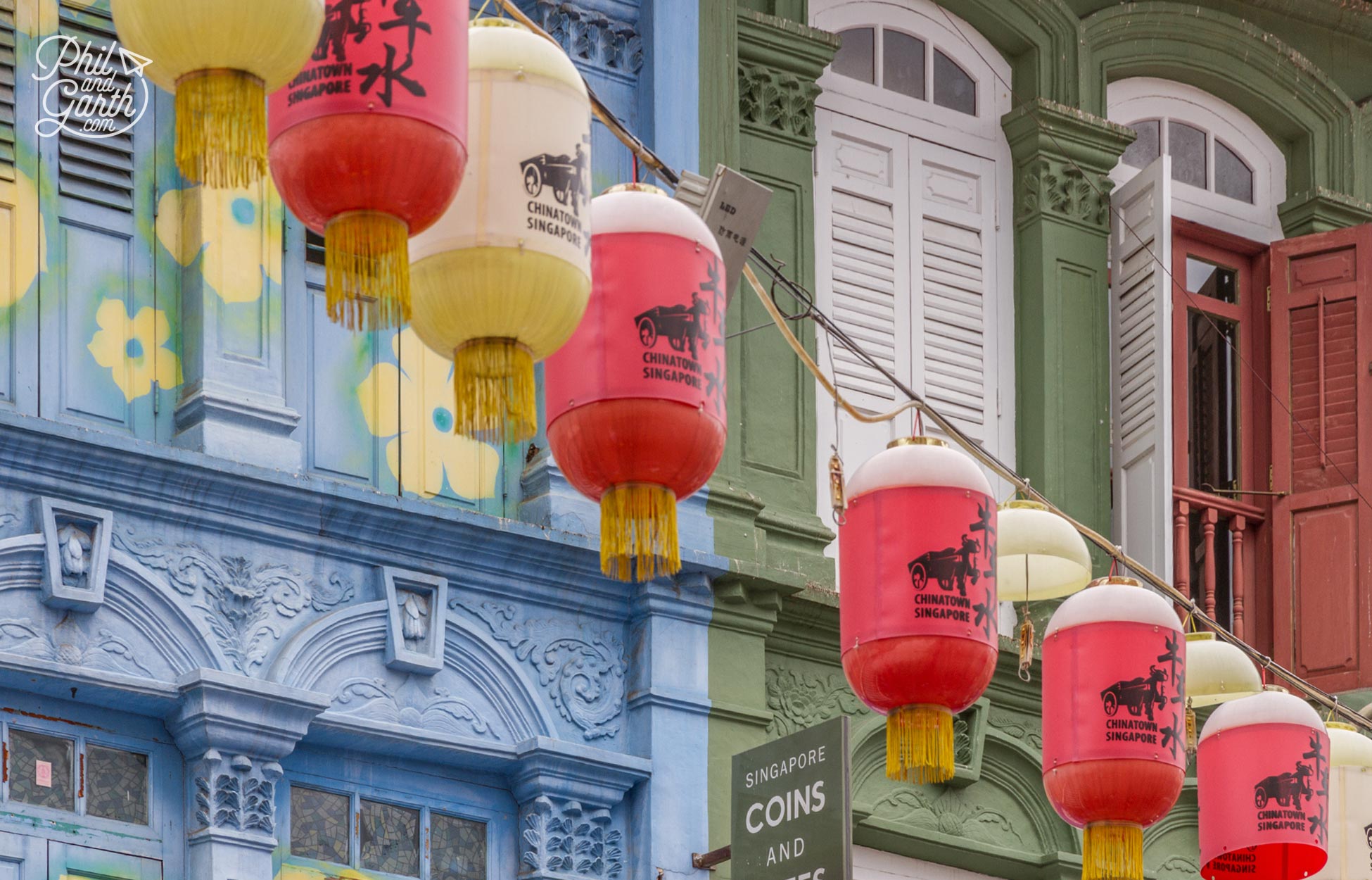 Don't forget to look up at the colourful shophouse facades and lanterns overhead