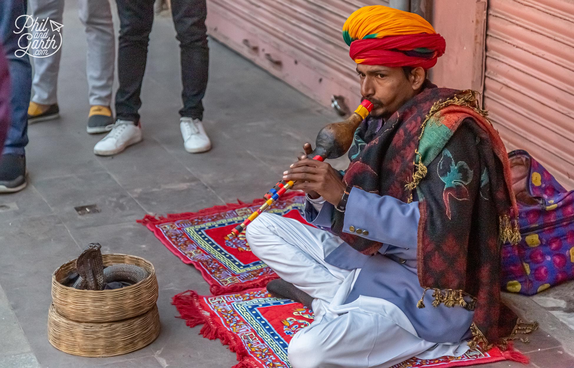 Outside Hawa Mahal are loads of hawkers, including snake charmers!