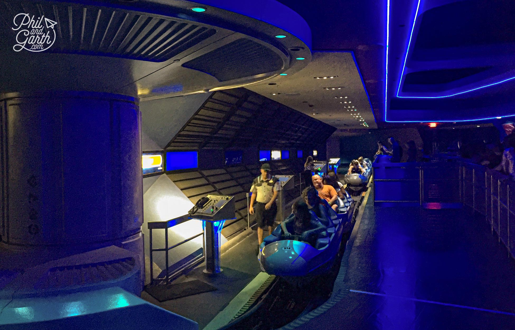 Waiting in line to get onboard the Space Mountain rollercoaster