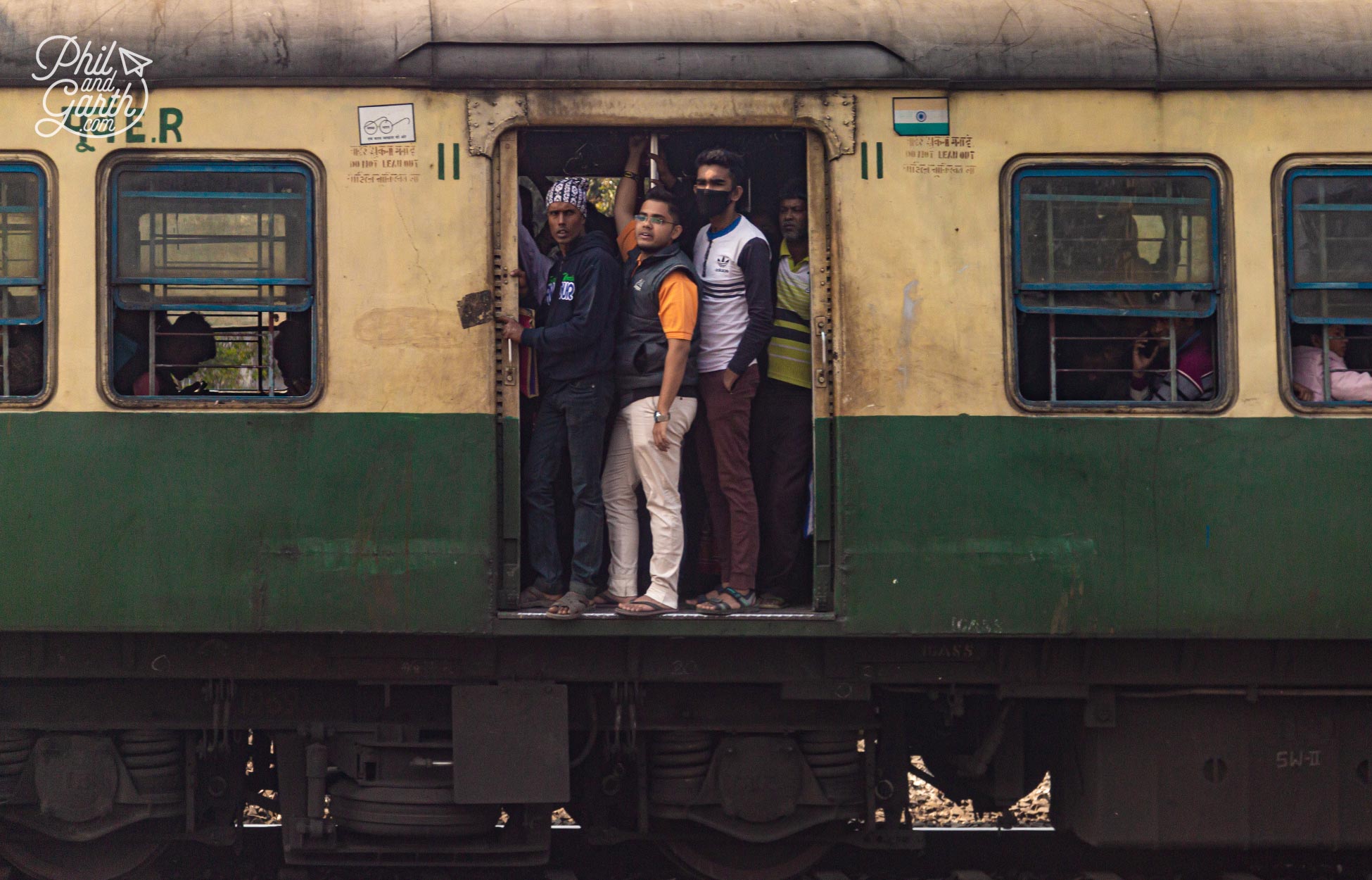A commuter train into Kolkata - the closet sight we saw to people hanging out of trains