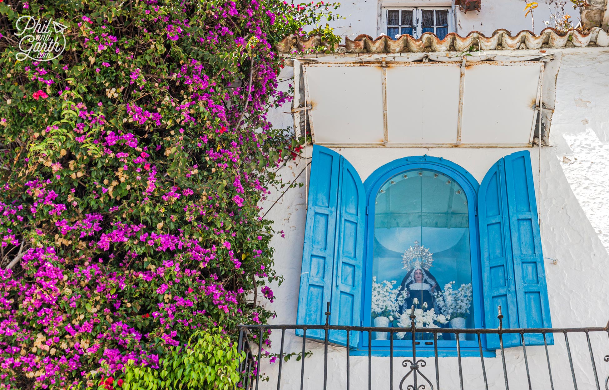 Look up to see many windows with shrines to the Virgin Mary