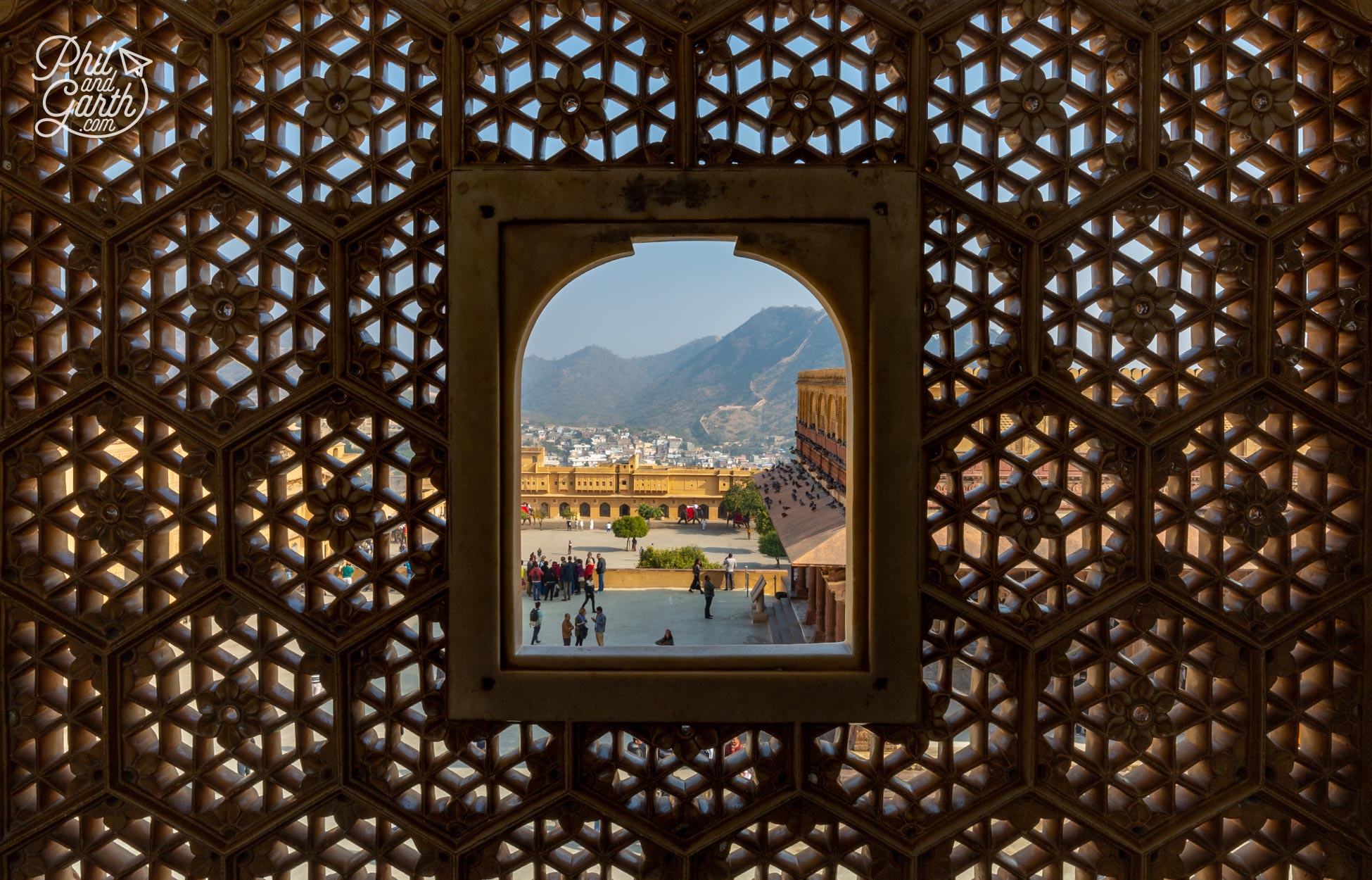 This small window is where the King's wives would look on to the 2nd courtyard below without been seen