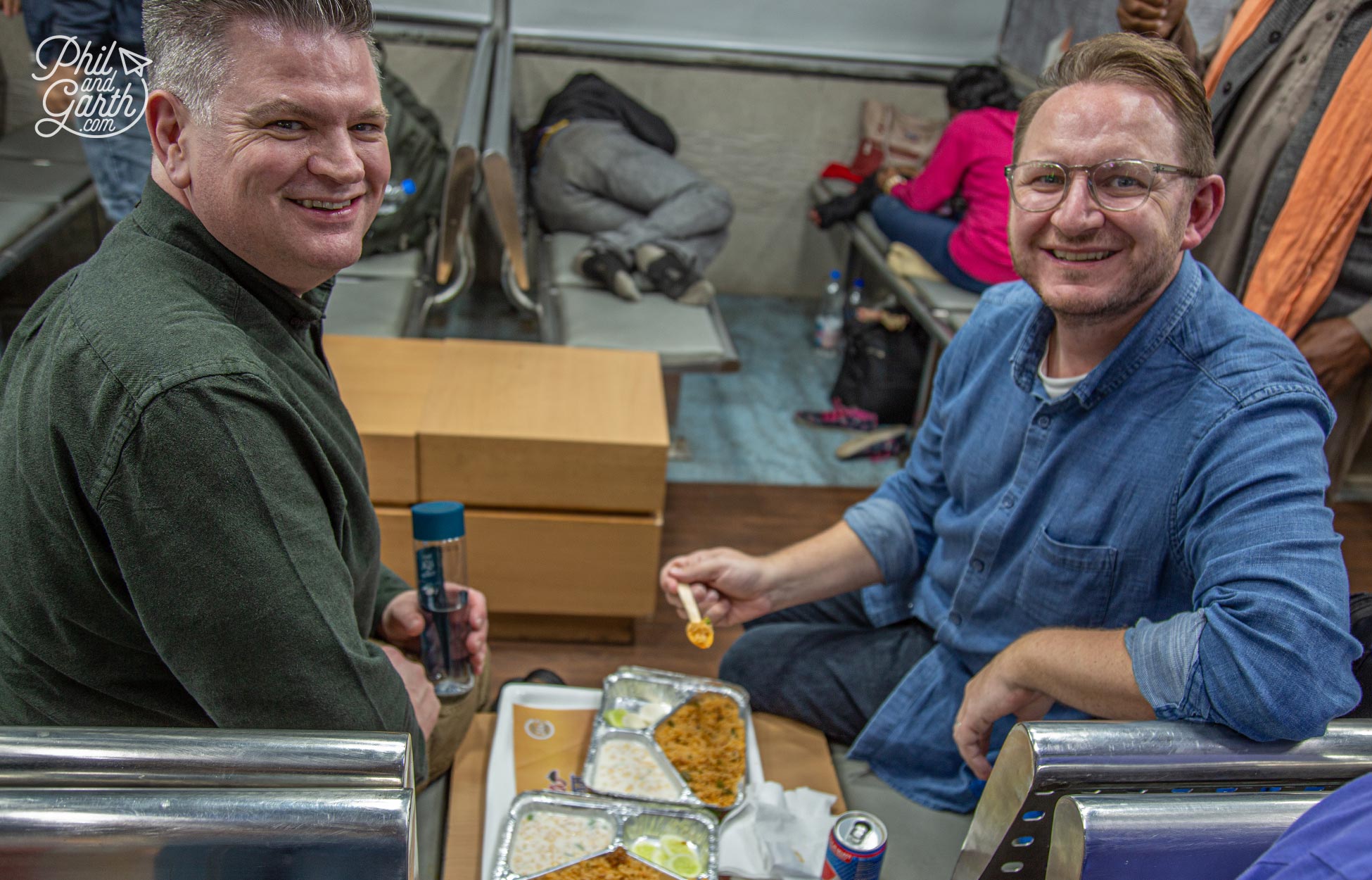 Enjoying our vegetable biryani before boarding the sleeper train