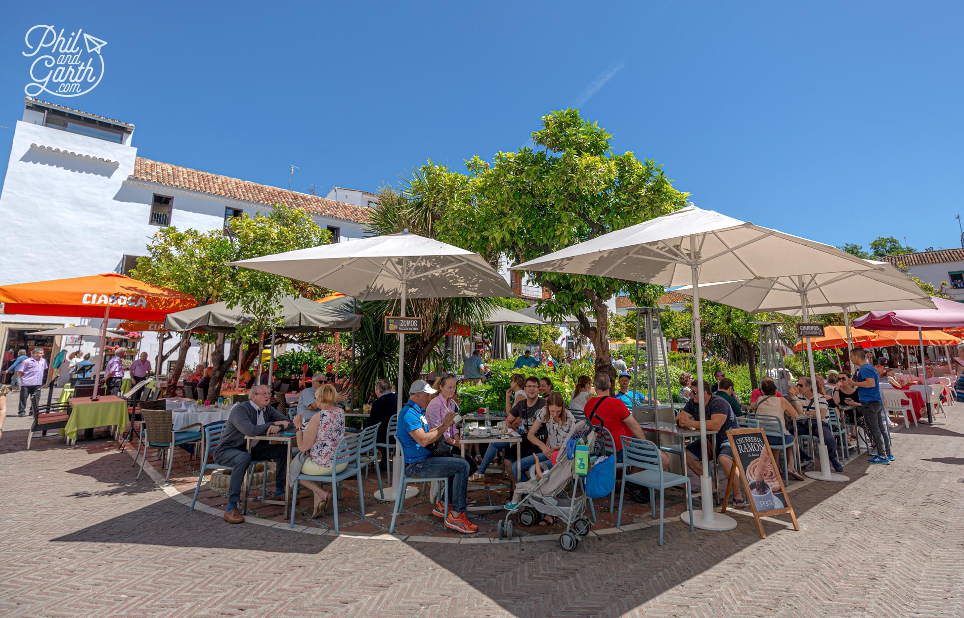 Grab a coffee on Orange Square and watch the world go by