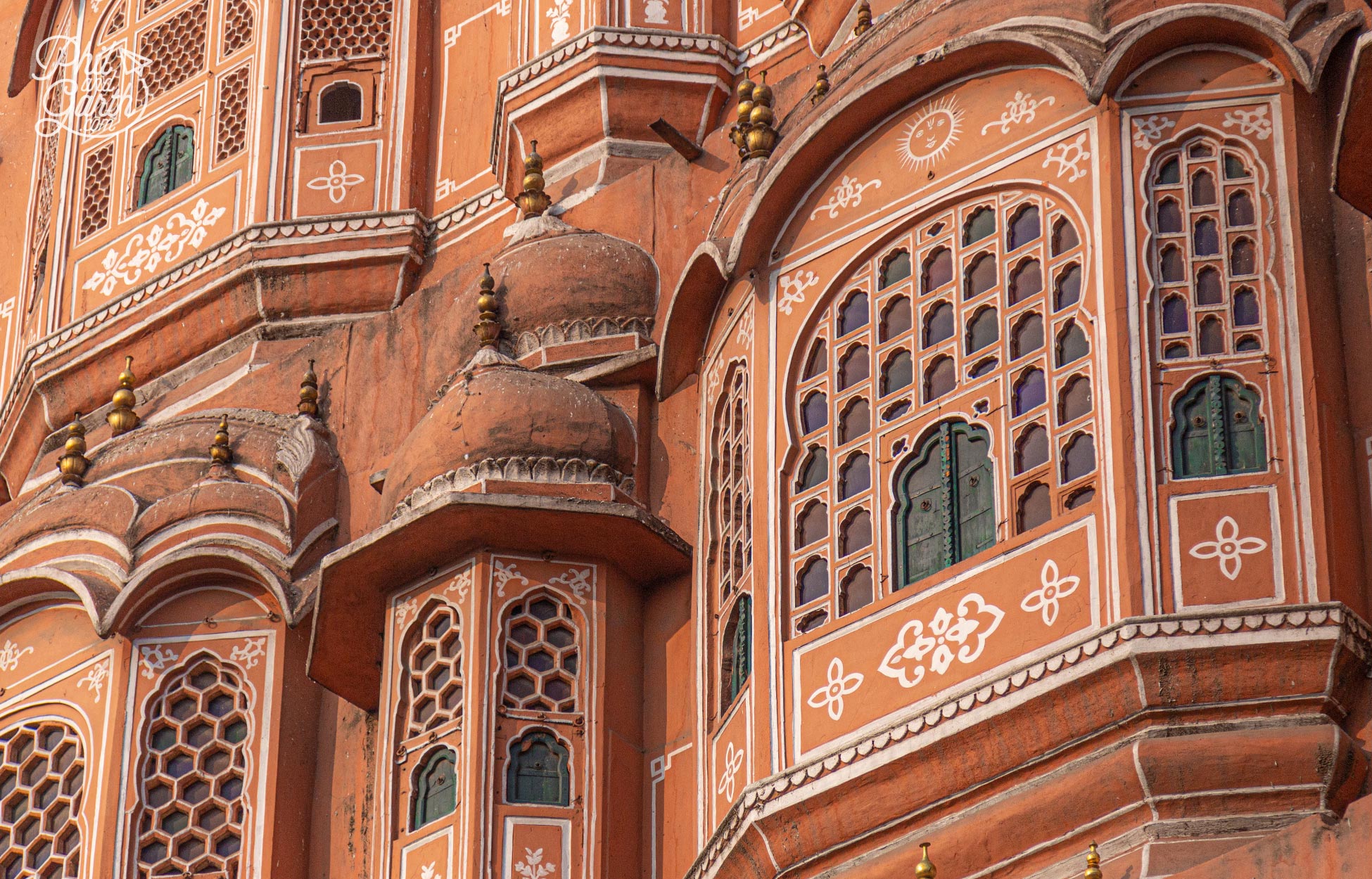 The overhanging bay window balconies are called jharokhas