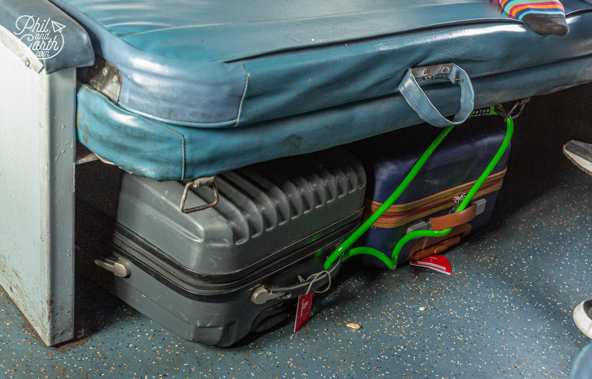 Padlock your suitcases to the metal rings underneath your seat/bed on sleeper trains