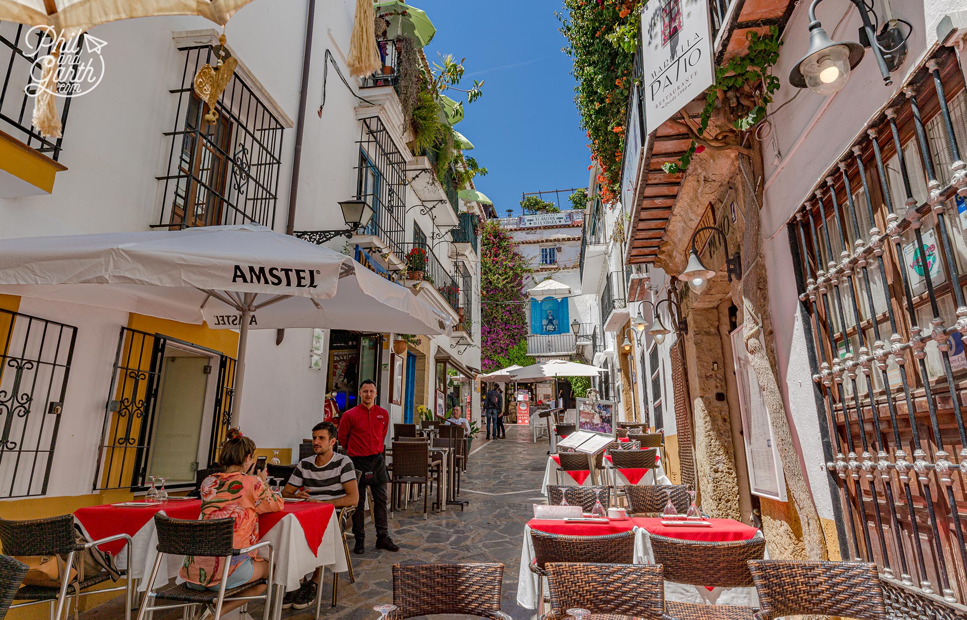 Restaurant tables spill out onto the streets