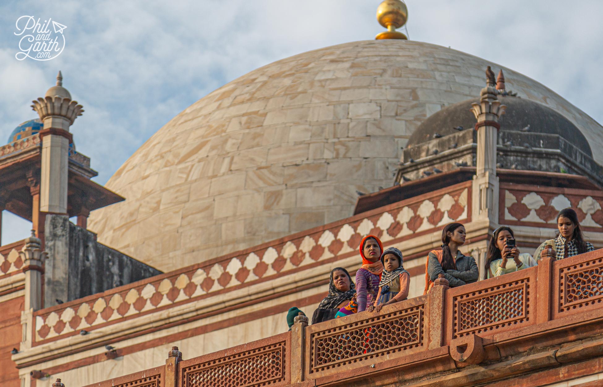 The central dome is double layered. The exterior is covered in white marble