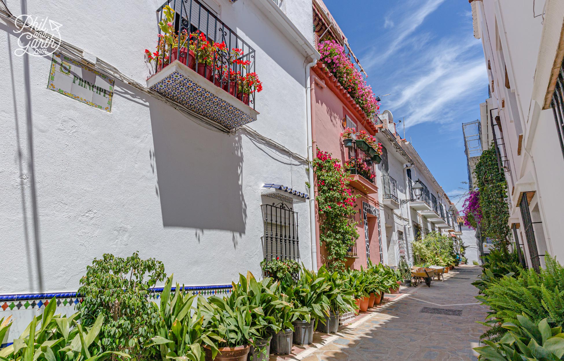 Flower pot filled balconies and streets in the Old Town