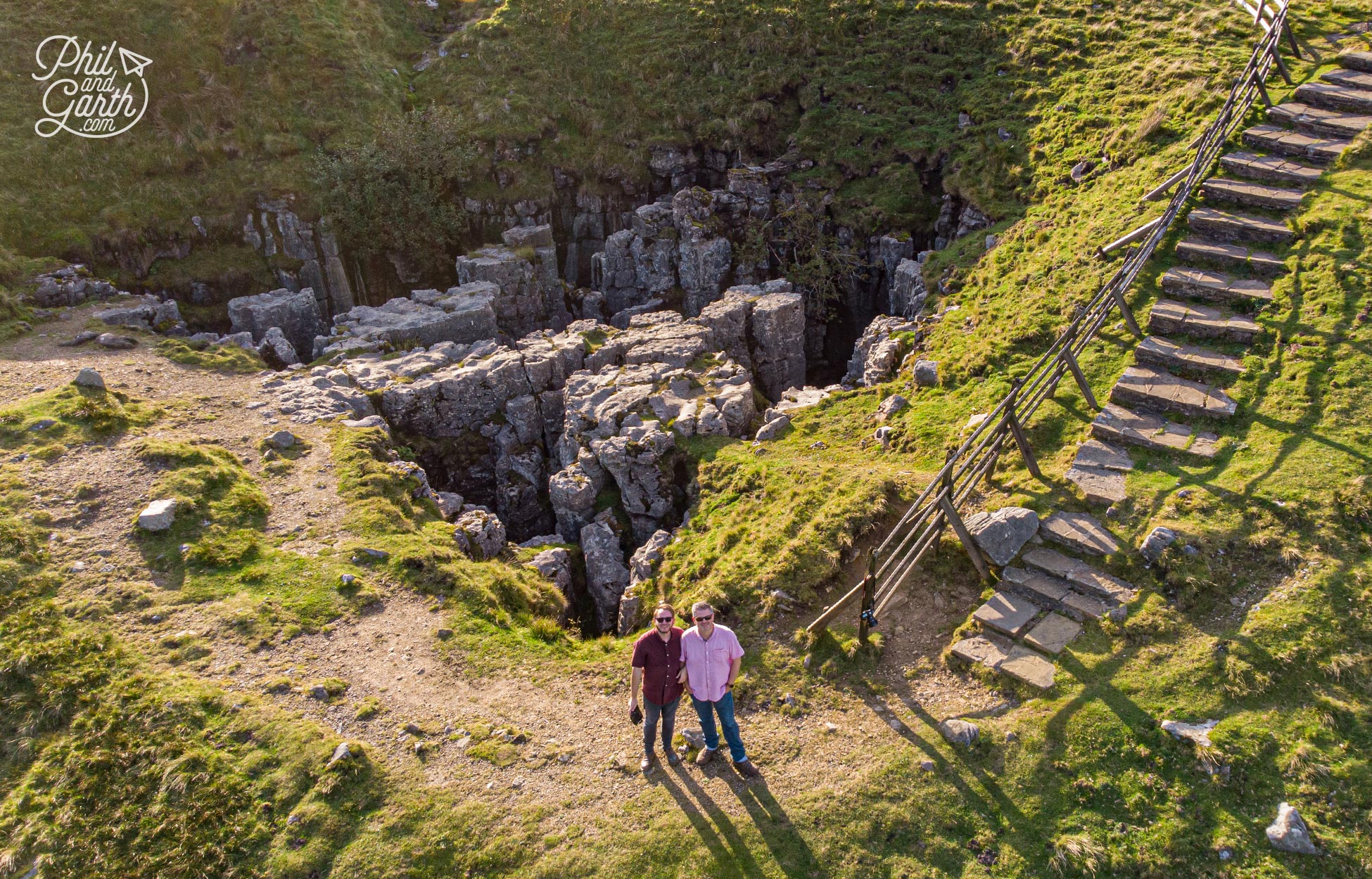 Checking out one of the Buttertubs deep limestone potholes