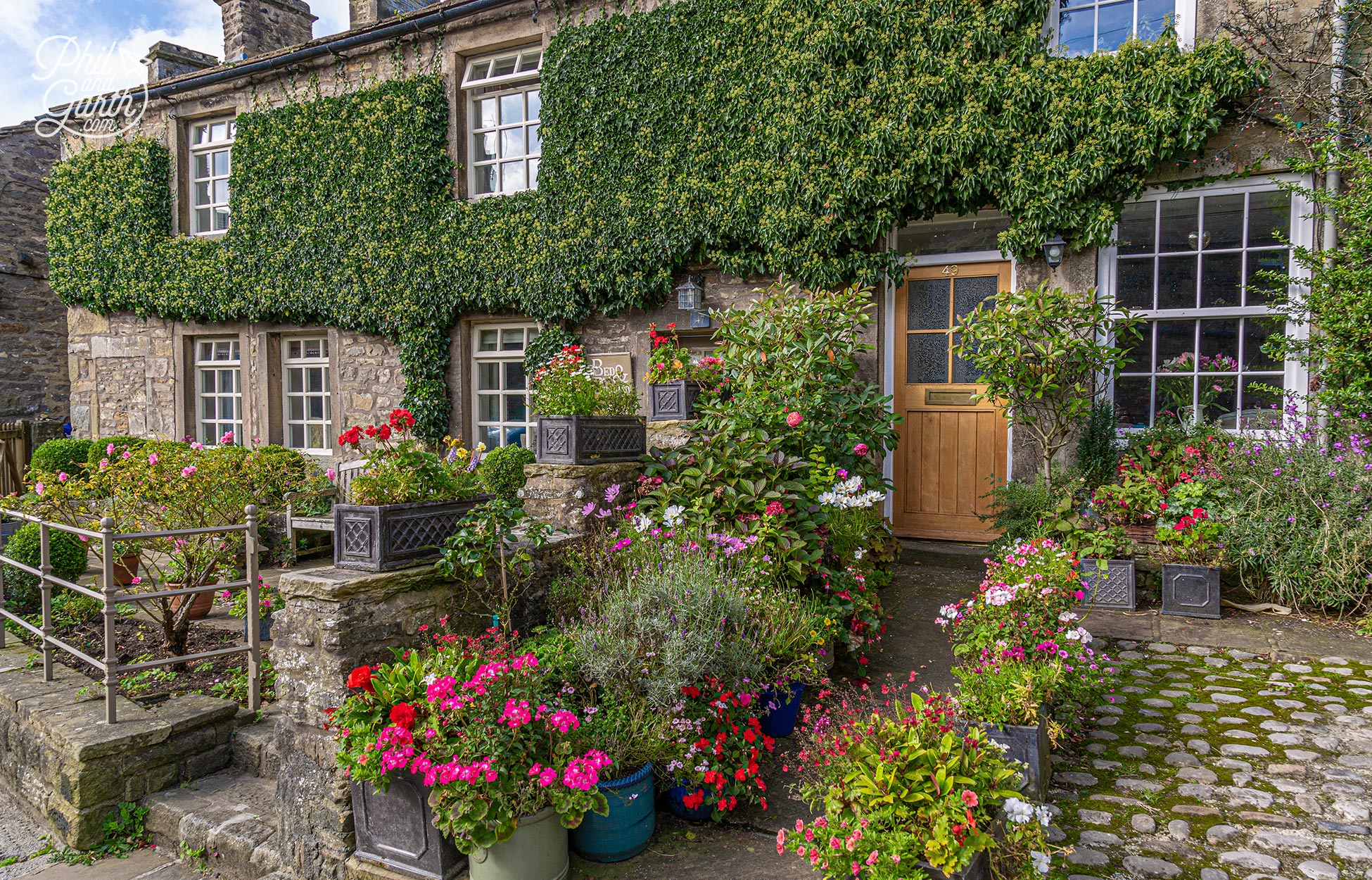 Pretty flower filled front gardens in Grassington