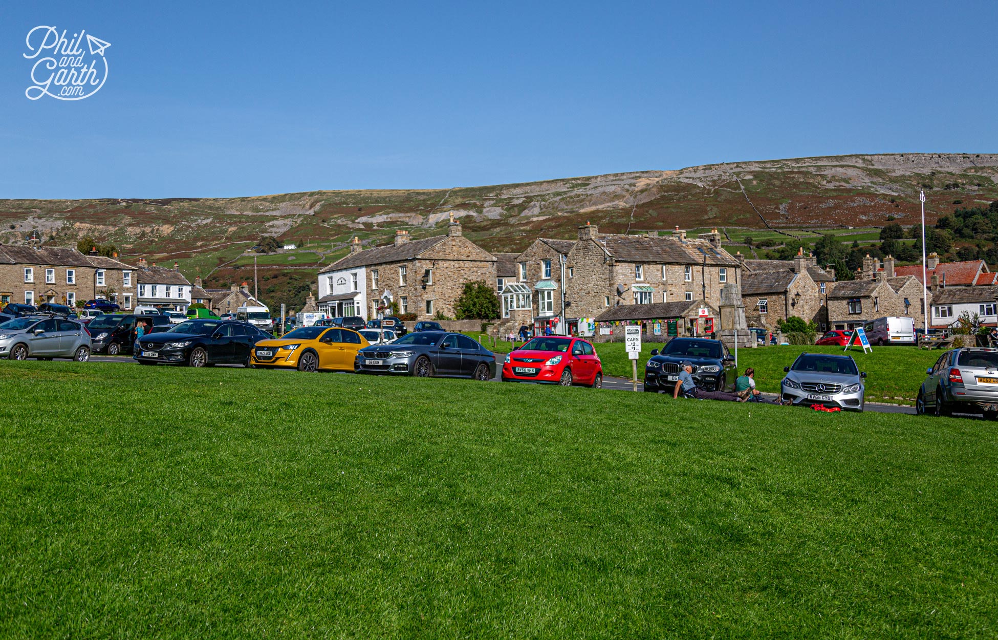 Reeth's village green is surrounded by pubs, shops and homes