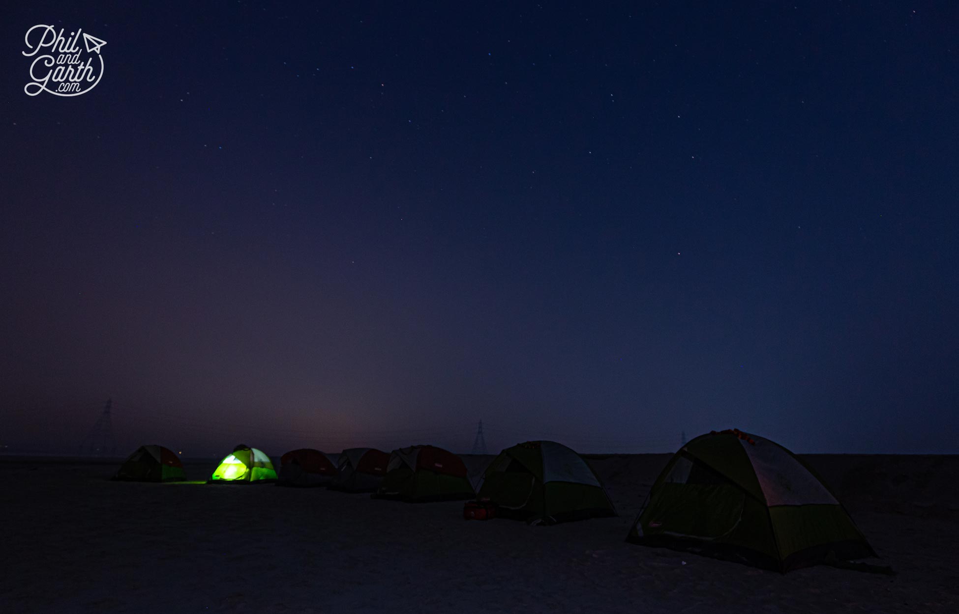 Camping under the stars on the banks of the River Ganges in India