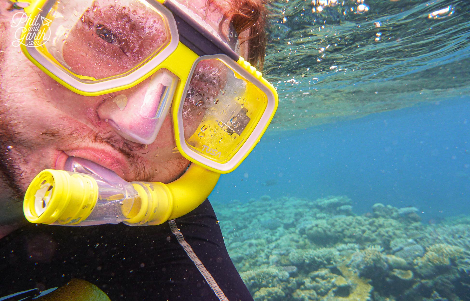 Garth taking a selfie whilst snorkelling over the Great Barrier Reef