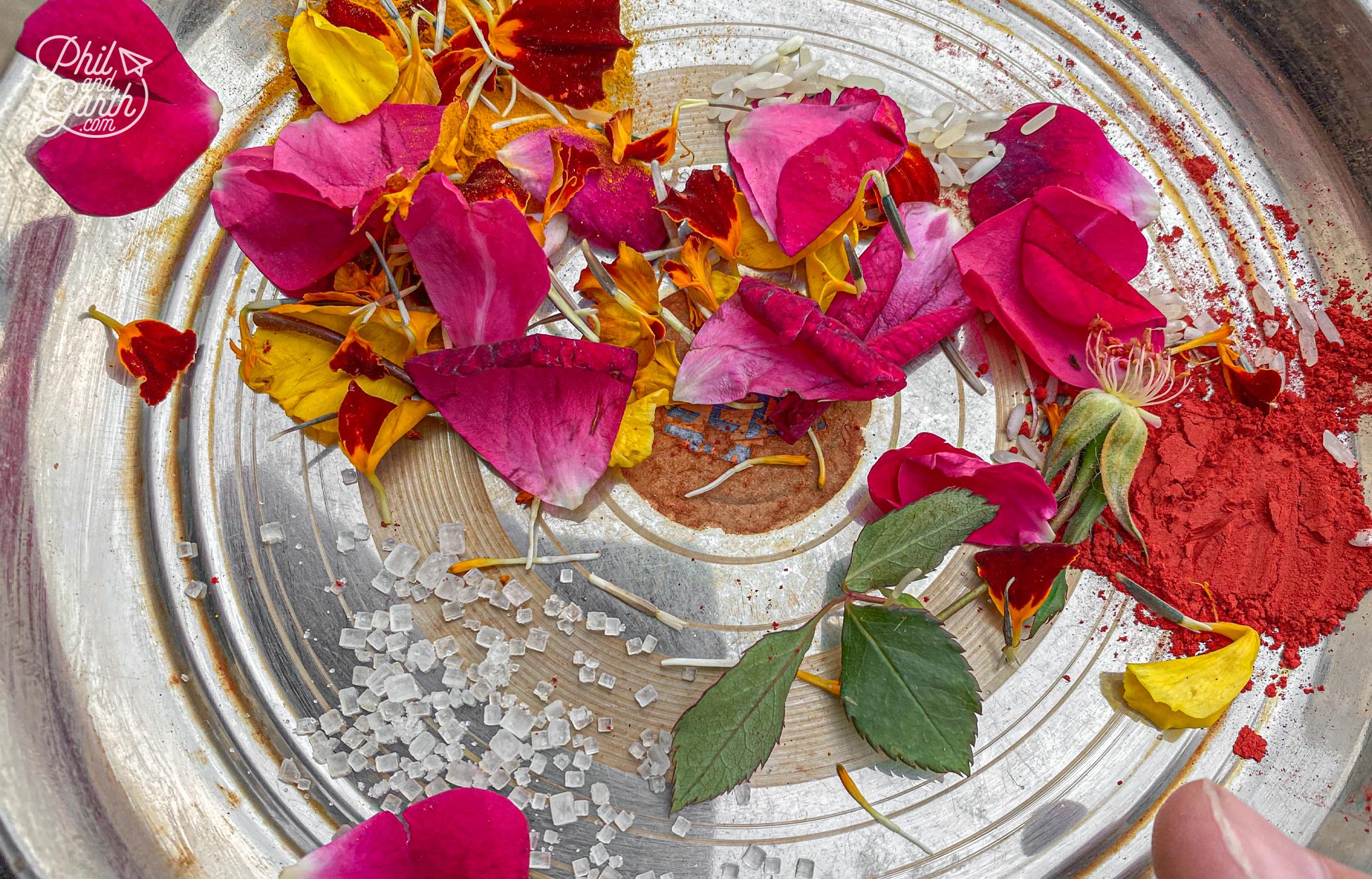 Our tray of offerings included rice grains, spices and rose petals