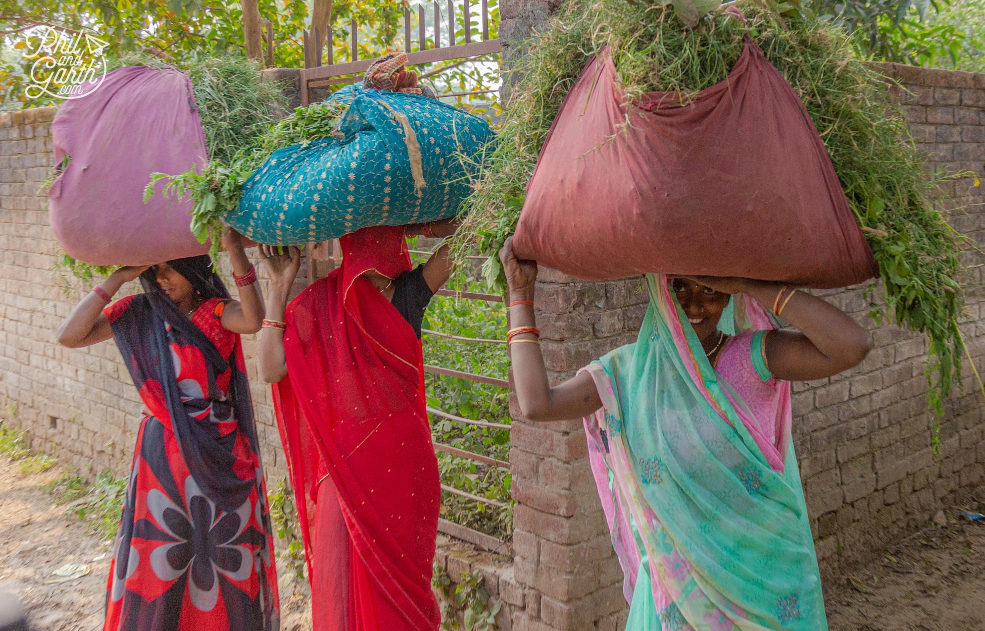 These ladies gave us big smiles as we slowly drove through another village