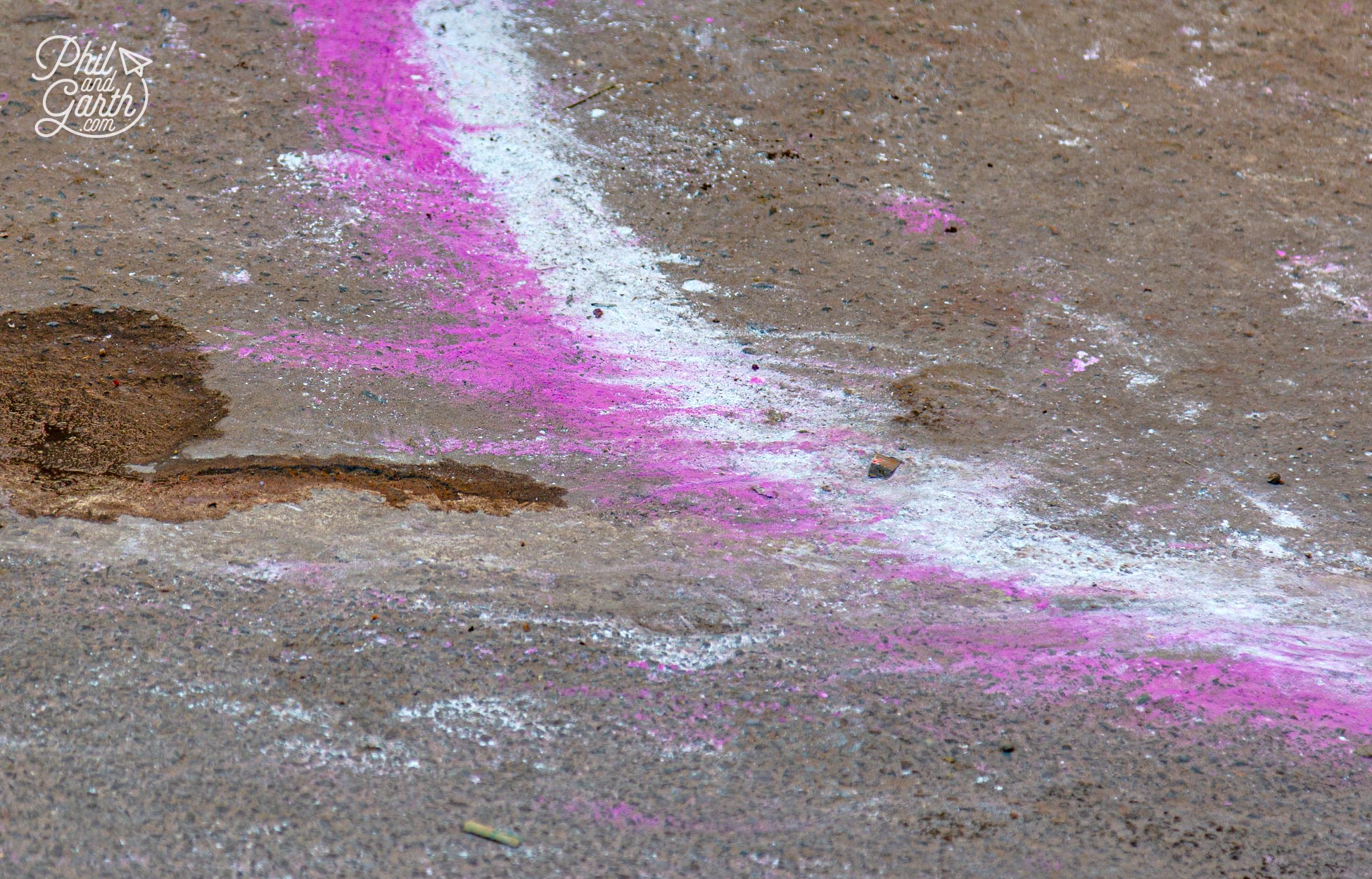 If you see a chalky powder trail on the streets like this, it's to lead guests to the venue of a wedding