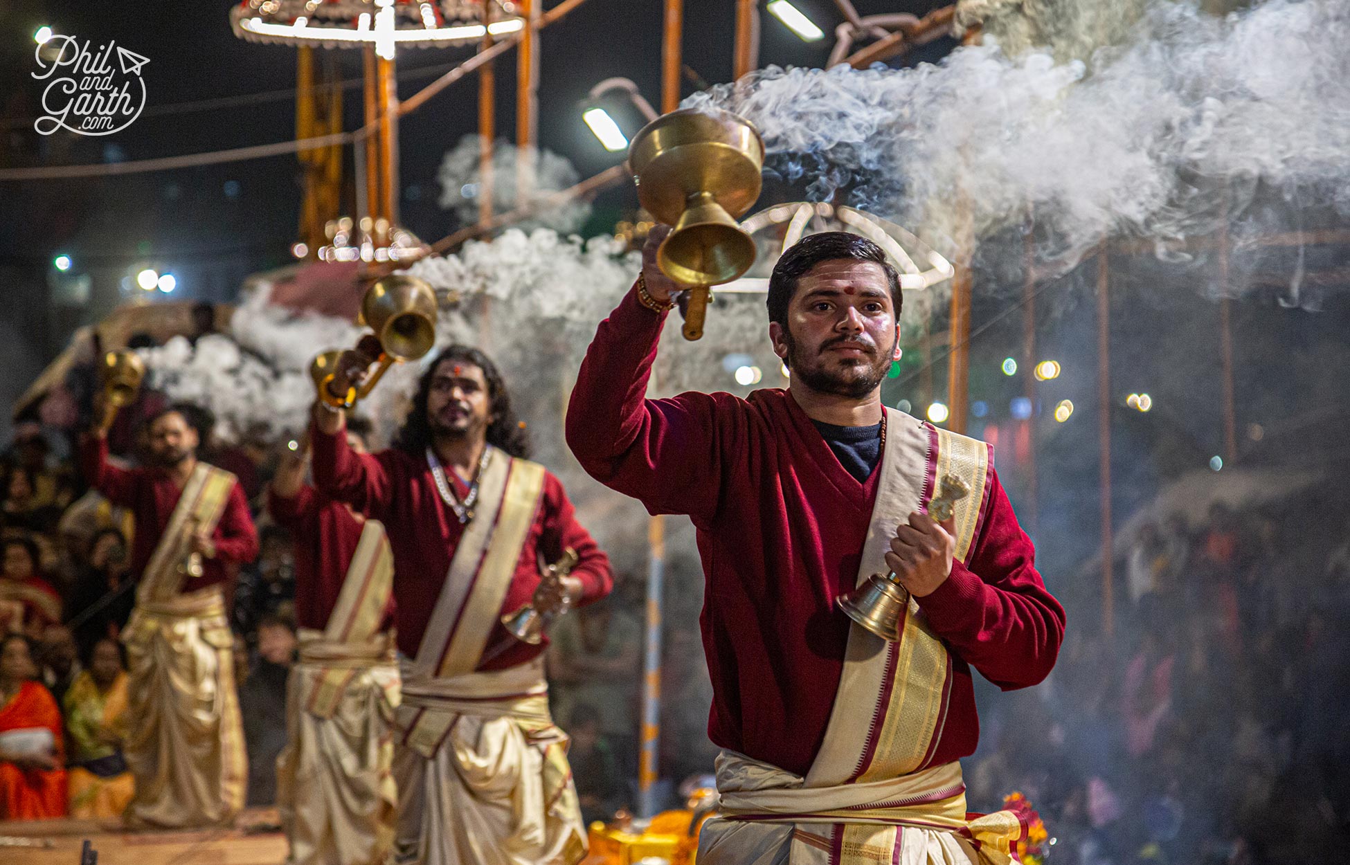 Young monks and priests perform the nightly Ganga Aarti ceremony