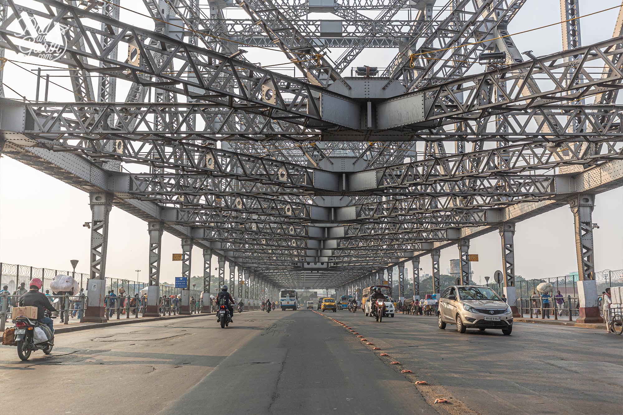 Crossing over the The Howrah Bridge which links the two cites of Kolkata and Howrah