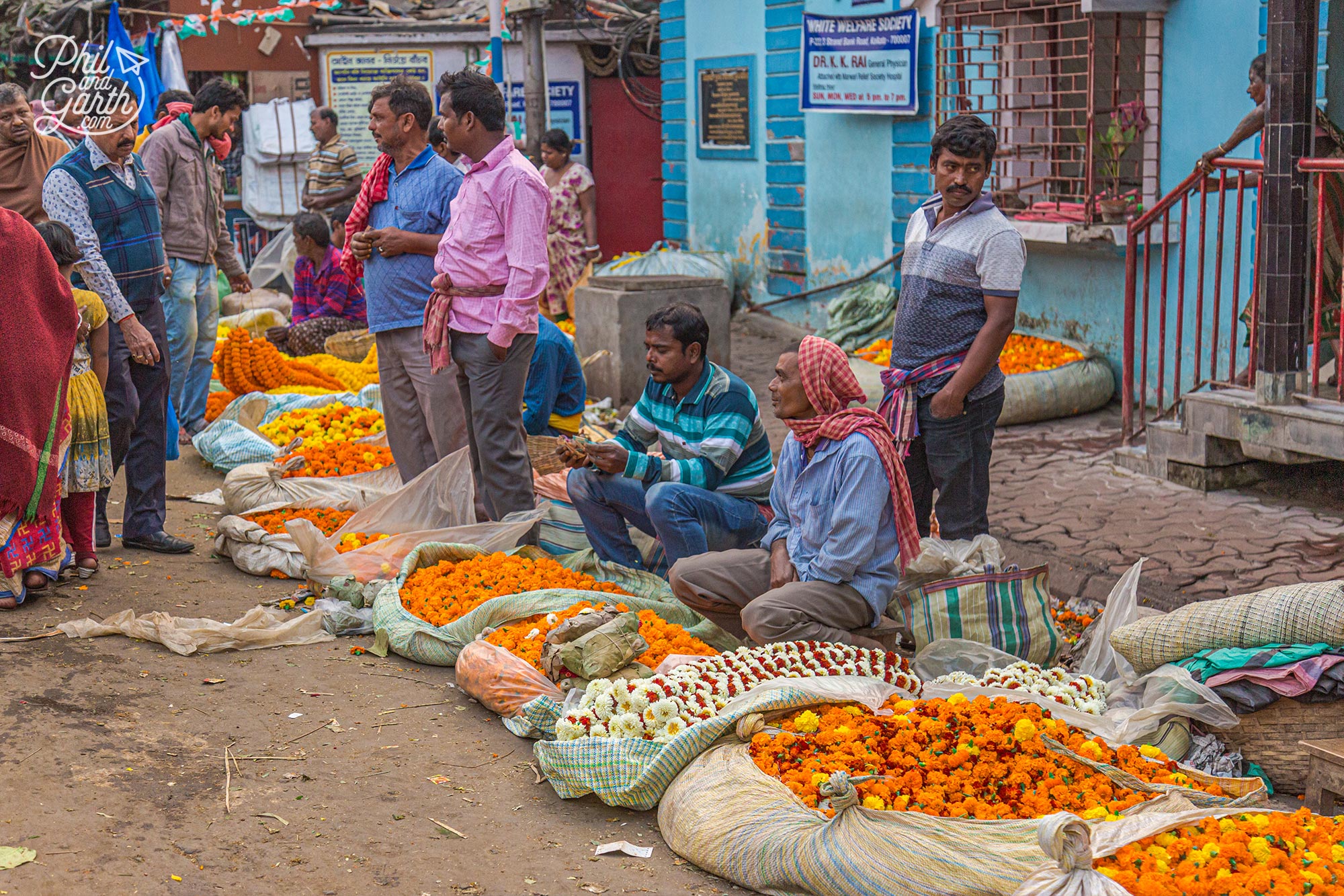 Flower traders negotiate deals all day 