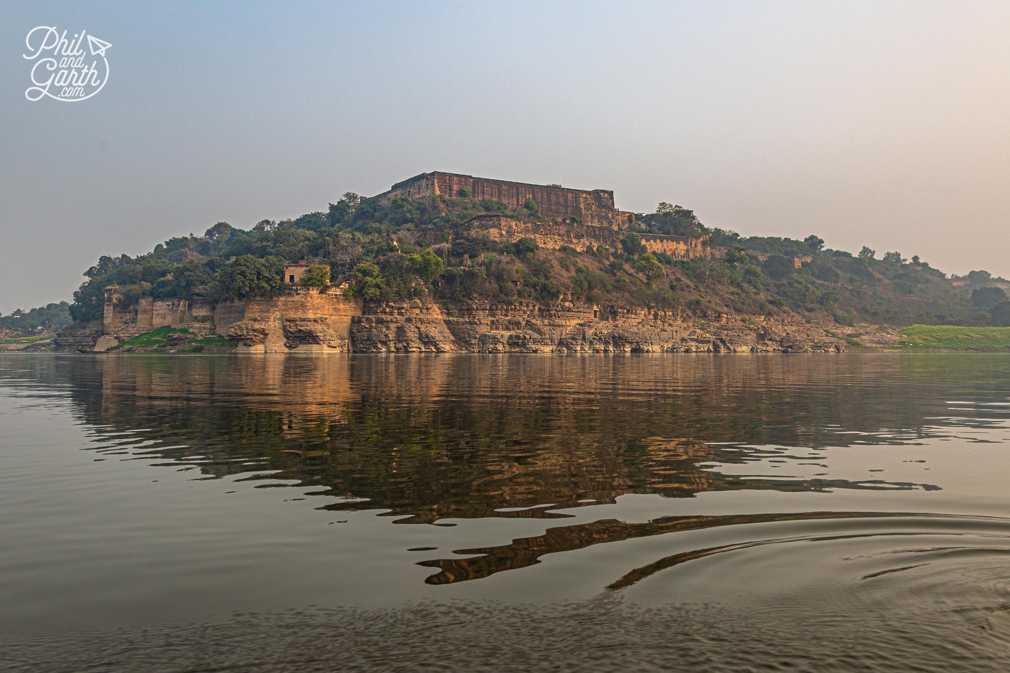 On the banks of the River Ganges, we sail pass Chunar Fort