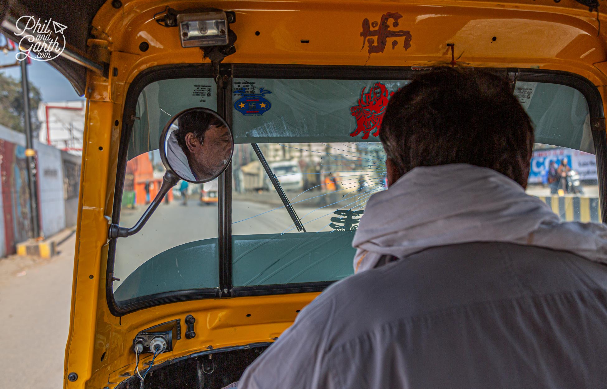 One of our many tuk tuk drivers