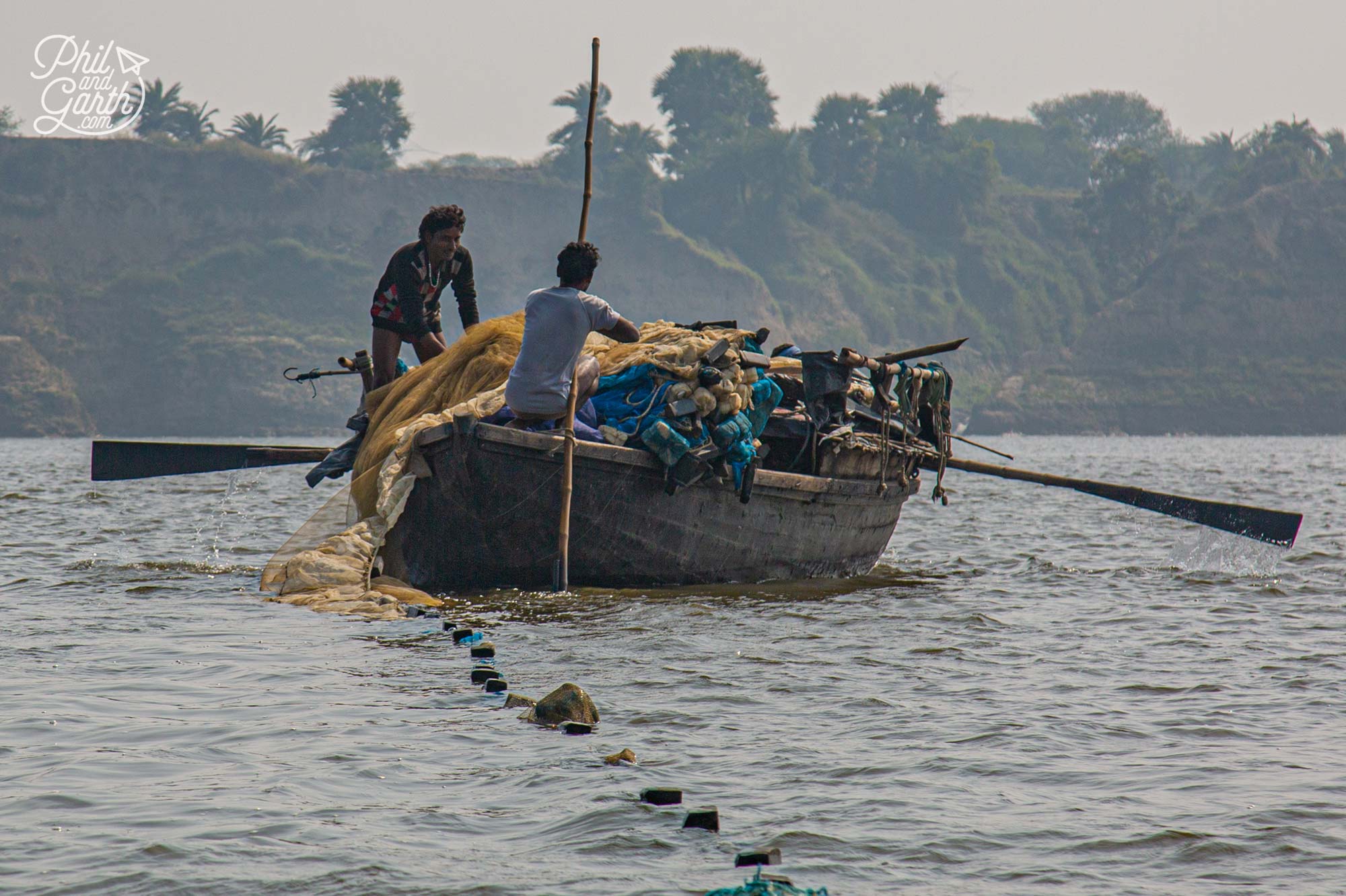 Passing lots of fishing boats like this one filled with nets