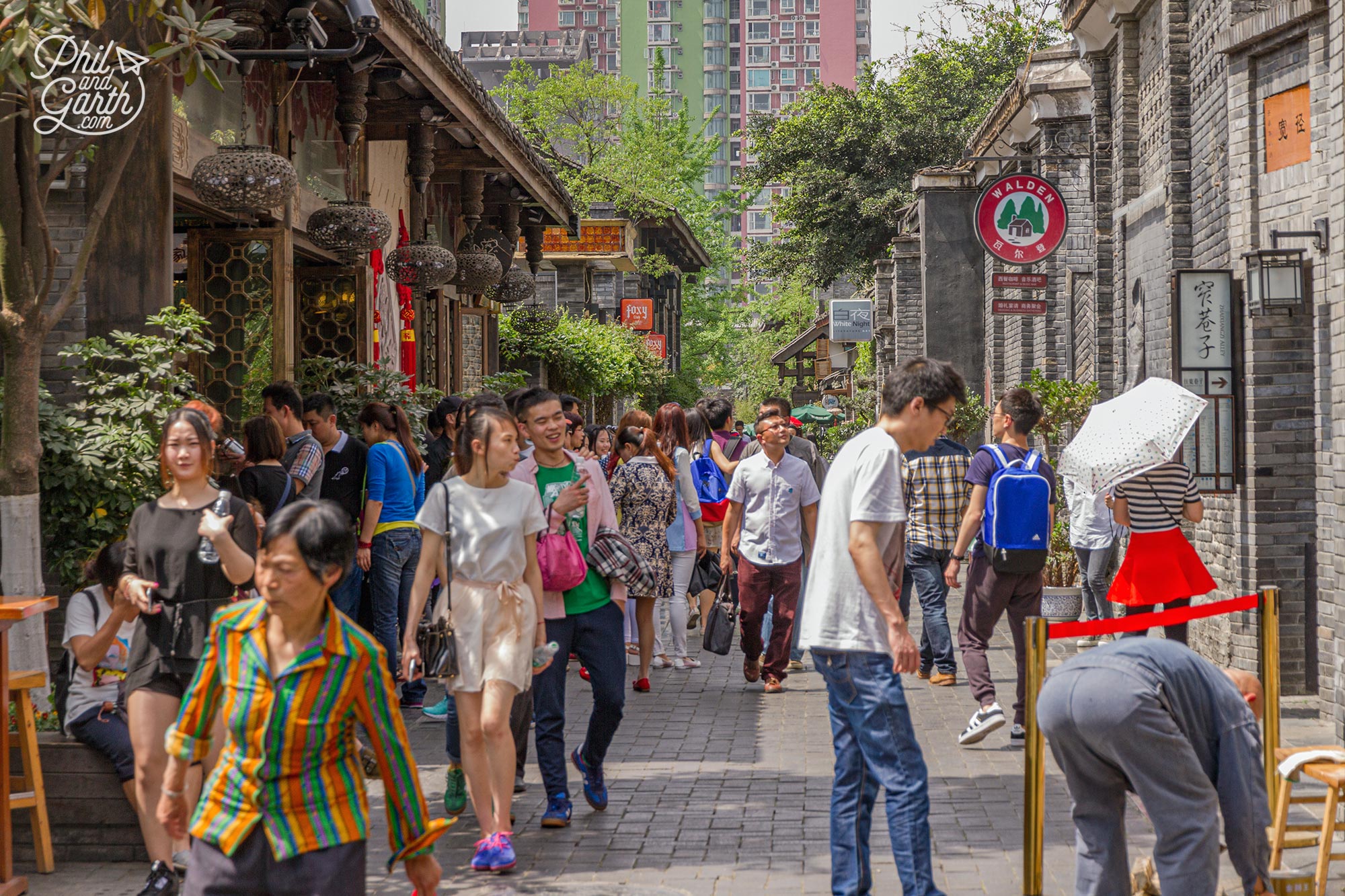 People enjoying the nice atmosphere on Wide and Narrow Alley