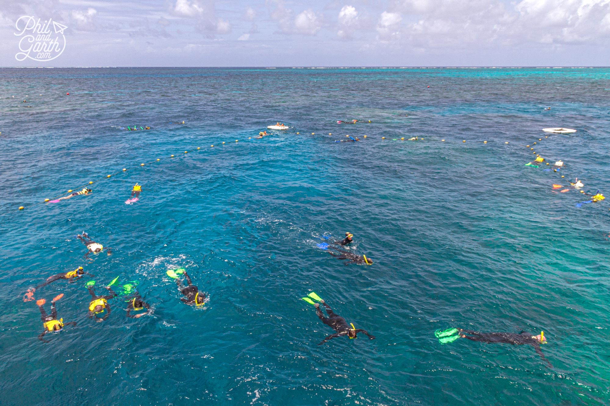 People enjoying snorkelling over the Agincourt Reef Great Barrier Reef