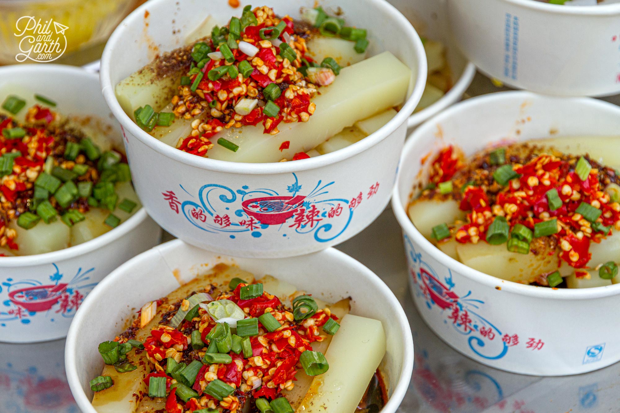 Sichuan food is well known for being the spiciest food in China. This street food snack is Spicy Mung Bean Jelly